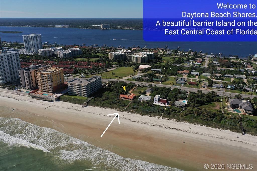 FANTASTIC OPPORTUNITY and RARELY available! Located on a beautiful Barrier Island on the central East Coast of Florida.
Well designed to feature amazing oceanfront views from nearly every room in the home. Capturing the essence of the iconic Florida beach lifestyle, this amazing 4 bedrooms, 3.5 baths, Oceanfront Estate home has spectacular, panoramic views of the Atlantic ocean and boasts 100 feet of Ocean Frontage with almost a full acre of land in beautiful Daytona Beach Shores, Florida.
This one of a kind home has the character that newly built homes lack. Dating back to 1952 the home has had extensive updating but has not lost any of its charms. The stylish iron double-gated entry opens to a view of palm trees winding down the peach stone-paved driveway with beautiful tropical landscaping and green grass.
You will notice how much frontage this double lot offers to have the home set back so far from the street offering privacy and serenity to listen to the ocean. The foyer entry to the home shows the character of the 50s. With stunning Marble floors and a view to the impressive Great Room with light coastal wooden vaulted beamed ceilings, more marble flooring, a fireplace to warm up to and relax during our short winters. The windows take up the complete wall to see a full panoramic view of the ocean.
The large Flatscreen fits nicely over the fireplace and has an oversized couch & other comfy armchairs with ottomans to relax and enjoy the ocean. Every room on the East side of the home has an ocean view.
The open full kitchen has counter seating for four and a dining room with more views of the ocean. The large Master bedroom is located on the main floor with an en-suite bath and both oversized bedrooms 2 and 3 are on this main floor with a full Jack and Jill bath between them. The 4 BR is on the upper level along with a full bath. Many Upgrades Barrel roof and more.
All information provided is deemed reliable but is NOT guaranteed ;Water: City