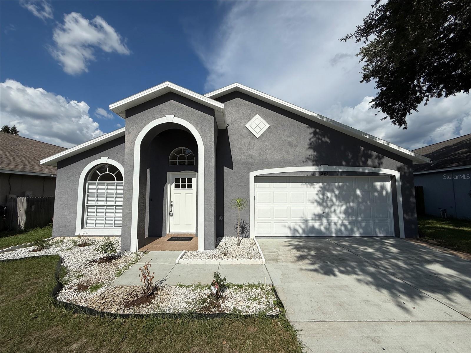 Newly renovated, bright and cheerful 3-bedroom, 2-bath home with a 2-car garage located in the desirable Brandon Brook community, has a community pool, low HOA, and no CDD. This home went through a complete makeover with Fresh interior paint, waterproof luxury vinyl flooring, New Kitchen, New bathrooms, etc. As you arrive, the inviting covered front porch sets the tone for a home designed for comfort. Step inside to an open living and dining area, ideal for hosting and everyday living. The light-filled kitchen features a dinette space, a closeted pantry, Stainless steel appliances, all wood white shaker cabinets, and a quartz counter-height bar for additional seating. Just off the dinette area, find the laundry room with access to the attached garage. A second living area sits just beyond the kitchen, complete with sliders leading to the outdoor living space where you find the hot tub. The Primary Suite, located on the east side of the home, offers a spacious bedroom, walk-in closet, and brand new en suite bath with a double vanity, linen closet, and walk-in shower. The two additional bedrooms and new full hall bath are located on the west side of the home, offering privacy and convenience. Step outside to the large screened patio with lighting— perfect for relaxing year-round. The fully fenced backyard features plenty of open space for gardening, play, or future enhancements. This move-in-ready home is close to shopping, dining, golf courses, and entertainment, with easy access to Hwy 60, I-4, and I-75. With its fresh interior updates and prime location, this home is an exceptional find. Schedule your private showing today before it’s gone!
