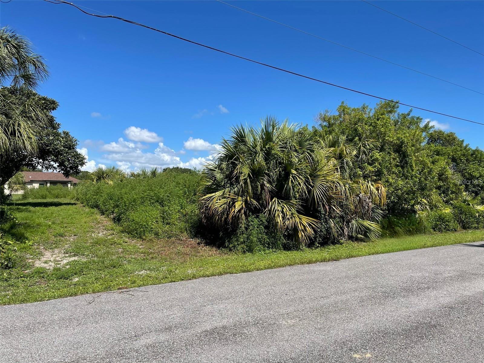 Discover the perfect opportunity to build your dream home on a beautiful lot, quietly nestled in the heart of North Port. This parcel is ideally situated on an active canal, offering both tranquility and scenic views. With the property located outside of any flood zone and free from both HOA or CDD fees, you can enjoy peace of mind and flexibility.  The lot’s prime location places you just ten minutes from the exciting, Wellen Park Downtown area and The Atlanta Braves Spring Training Baseball Stadium. Families will appreciate being within two miles of Sarasota’s highly rated schools, and beach lovers will enjoy easy access to several Gulf beaches, only twenty-five minute drive away.
Commuters and travelers will find convenient access to I-75, making trips north to Sarasota and Tampa or south to Fort Myers simple and efficient. Additional local attractions, including the Warm Mineral Springs, North Port Aquatic Center, Tampa Bay Rays Spring Training Stadium, as well as a variety of shopping plazas and parks, are all just a short drive away.  Don’t miss out on this exceptional opportunity to secure a perfectly located piece of property, ready and waiting for your new home.