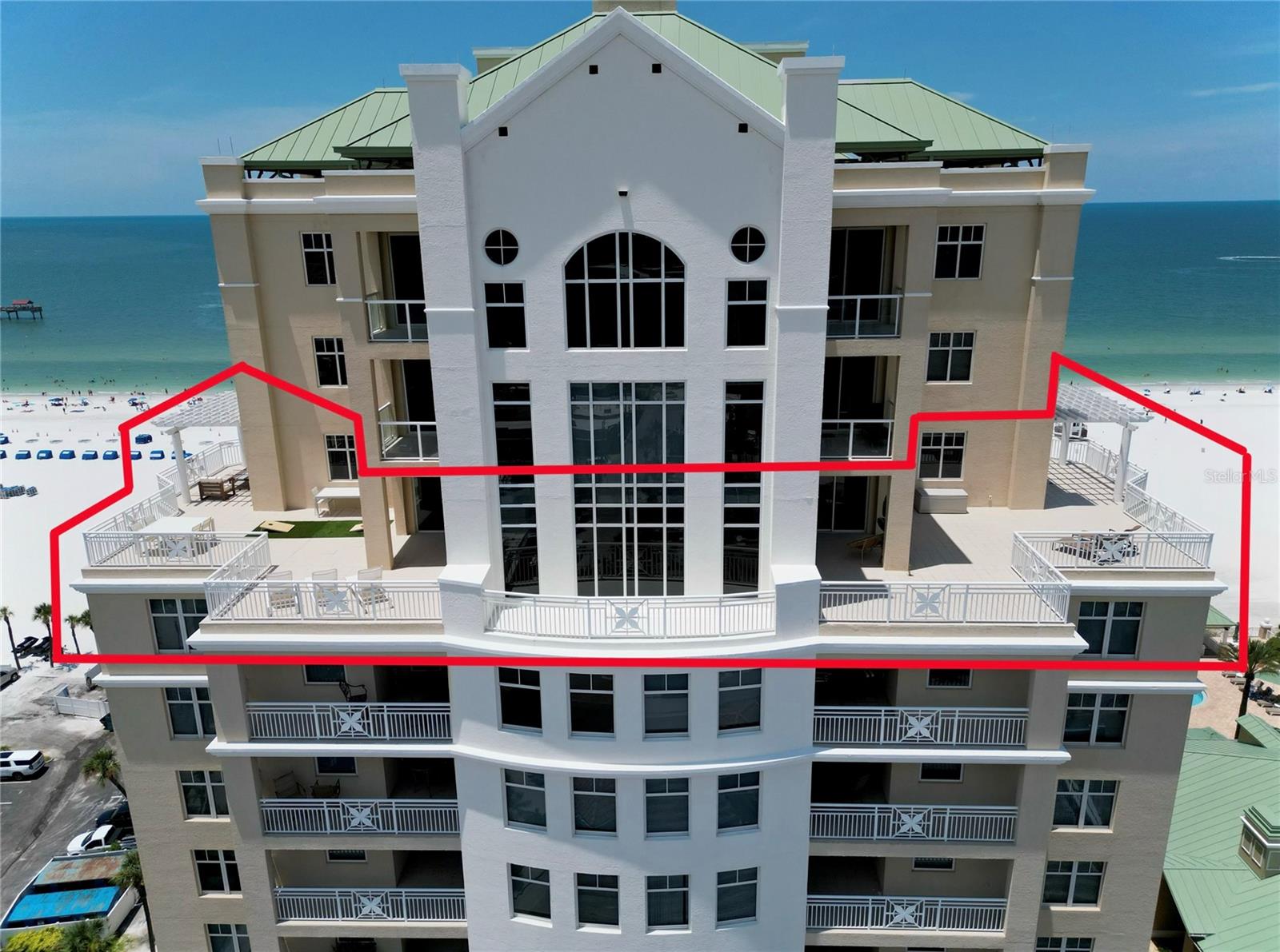 Experience unmatched luxury and stunning views with the largest patio and wrap around balconies on Clearwater Beach. Welcome to this extraordinary penthouse offering over 4,000 square feet of opulent living space and an expansive 3,000+ square foot patio. Enjoy breathtaking, panoramic views from every angle, embodying the pinnacle of luxury living. This unique residence boasts the largest patio in the entire Pinellas area, perfect for entertaining or simply relishing the serene surroundings. Step into a grand living space where floor-to ceiling windows frame panoramic vistas of the Gulf of Mexico. The expansive open floor plan seamlessly integrates the living, dining, and kitchen areas, making it perfect for entertaining and everyday living. The gourmet kitchen is a chef's dream, featuring high-end Wolf stainless steel appliances, custom cabinetry, and exquisite granite countertops. The master suite is a serene retreat, boasting its own private balcony with sweeping ocean views, a spacious walk-in closet, and a luxurious en-suite bathroom complete with a spa-like soaking tub, dual vanities, and a glass-enclosed shower. Additional bedrooms offer ample space and privacy, each with their own well-appointed bathrooms. This penthouse also includes access to exclusive building amenities such as a resort-style pool, state-of-the-art fitness center, private beach access, and secure parking. Located in the heart of Clearwater Beach, you’ll be just steps away from world-class dining, shopping, and entertainment. Whether you're looking for a permanent residence or a luxurious vacation home, 10 Papaya Street, Penthouse #1404 offers an unmatched lifestyle of comfort and elegance.