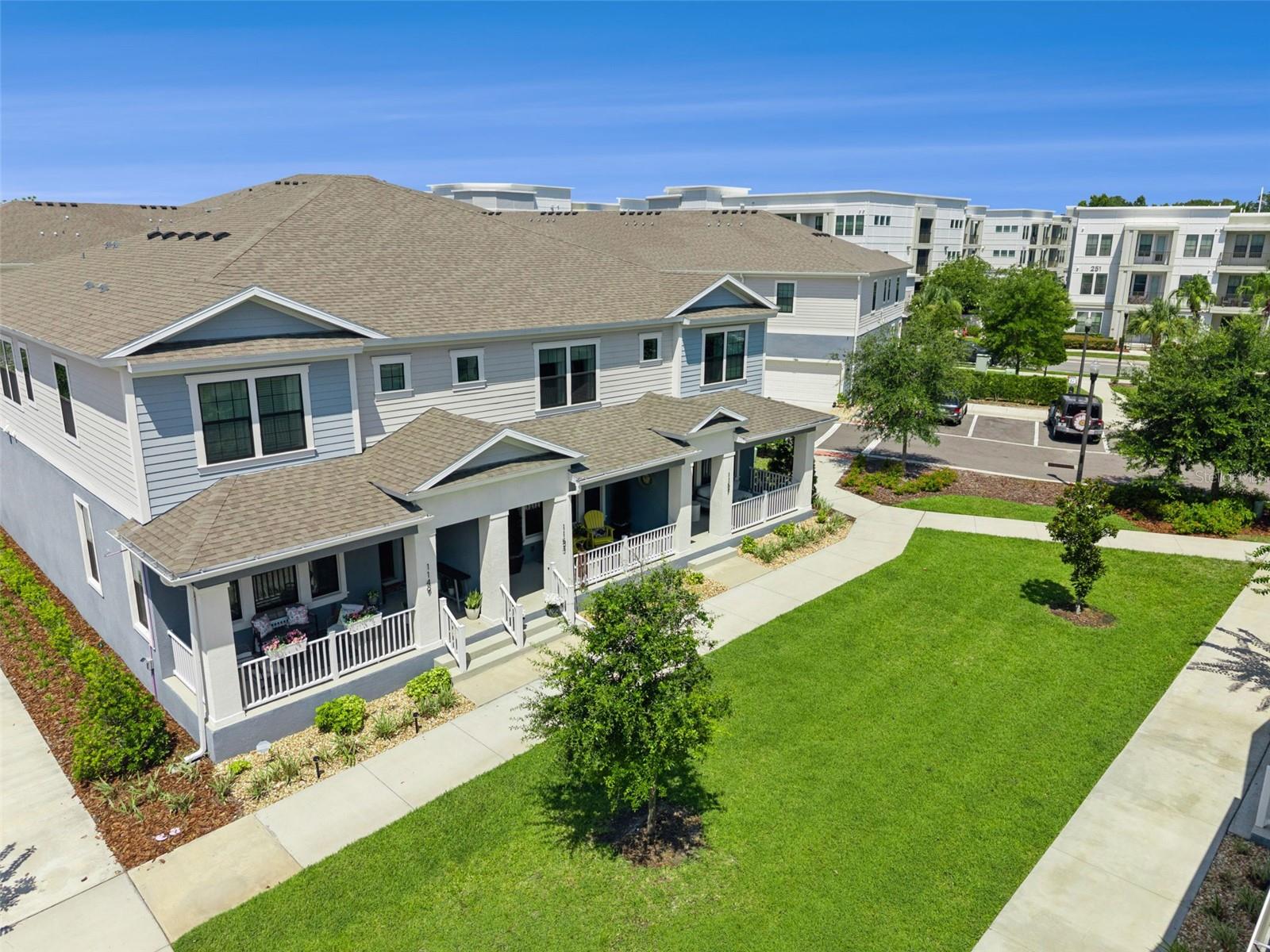 Experience the perfect blend of luxury, convenience, and lifestyle in this stunning 3-bedroom, 2.5-bath designer townhome, ideally situated in the heart of Winter Springs, one of Central Florida's most sought-after communities. Beautifully appointed with designer finishes throughout, this exceptional residence offers an elevated living experience just moments from everything you love.

Step inside to discover a bright, open-concept floor plan where sophistication meets functionality. Premium Wood Laminate flooring, upscale finishes like 42 inch kitchen cabinets with under-cabinet lighting, elegant fixtures, and thoughtfully curated décor create a warm yet contemporary atmosphere that feels straight out of a design magazine. The spacious living and dining areas flow seamlessly into the gourmet kitchen, making this home equally suited for entertaining guests or enjoying a quiet evening at home. EVERY window in this home has electric shades that can be customized with timers, or easily opened-and-closed with a remote as smart-home has other included features such as LED lights, smart thermostat, bluetooth garage door, and more. 

Upstairs, the spacious owner's retreat provides a private sanctuary complete with a luxurious en-suite bath, a walk-in custom closet, while two additional bedrooms have generous accommodations for family, guests, or a home office. You absolutely cannot overlook the loft and it's feature as an office, extra TV room, a play area for the kids, or even an office - the possibilities of this bonus space upstairs is ready for your imagination! 

What truly sets this property apart are the rare features that are nearly impossible to find. Enjoy the convenience of being one of only three homes with an oversized driveway, providing additional parking and enhanced curb appeal, including an epoxy floor in the garage. Even more unique, this residence is one of only six homes that feels like a private green space directly outside the front door, offering a refreshing sense of openness, and privacy as you sit on your front porch. 

Location is everything, and this home delivers. Walk just steps to the renowned Seminole Wekiva Trail, where miles of scenic walking, jogging, and biking paths await. Spend your weekends exploring nearby parks, enjoying local events, or dining at the countless restaurants and cafés just minutes from your doorstep. Shopping, grocery stores, fitness centers, and everyday conveniences are so close that many daily errands can be accomplished within minutes.

With easy access to major roadways, top-rated Seminole County schools, and the charming atmosphere that has made Winter Springs one of Central Florida's most desirable places to call home, this property offers an unmatched combination of luxury and location.

This is more than just a townhome, it's a lifestyle. Opportunities to own one of the community's most desirable homes, complete with premium upgrades, rare outdoor space, and an unbeatable location, are exceptionally rare. Schedule your private showing today and discover why this remarkable residence stands above the rest.
