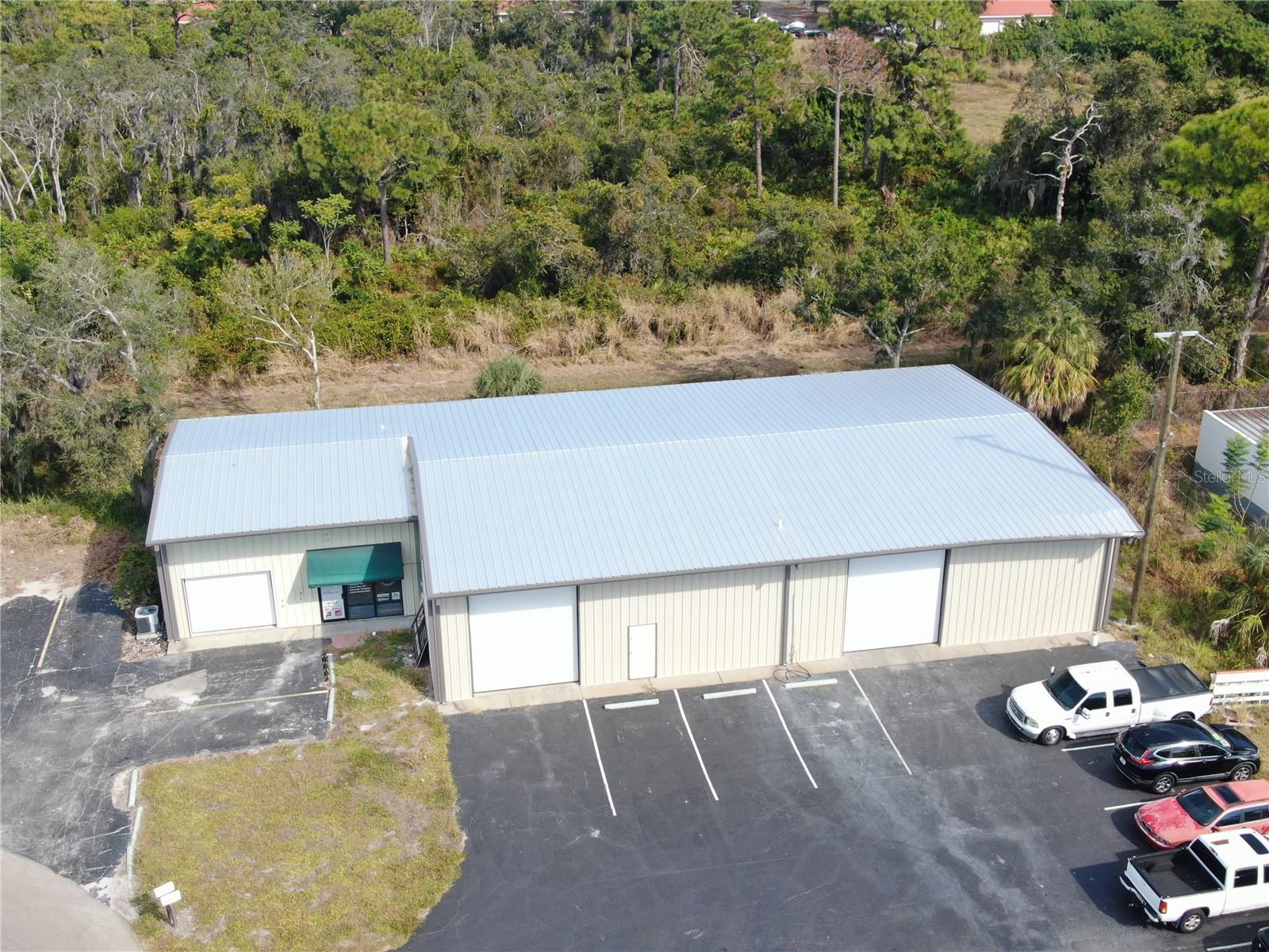PRICE IMPROVEMENT | Sarasota ILW Flex Warehouse for Sale | Turnkey Industrial Owner-User or Investment Opportunity

Turnkey ILW-zoned flex warehouse opportunity located within Sarasota’s Wipke Industrial Park just off Clark Road and Sawyer Road. This fully upgraded industrial property offers approximately 5,092± SF on nearly half an acre and is ideally suited for owner-users, contractors, light manufacturing, storage, distribution, showroom users, creative businesses, or investors seeking quality industrial product in a prime Sarasota location.

The property has undergone extensive recent improvements including:
• New roof and insulation
• Two new exterior walls
• Updated showroom and office build-out
• Three insulated 15’ electric roll-up doors
• Full climate control throughout the building
• LED lighting upgrades
• Modern designer finishes

The warehouse features approximately 17’ clear ceiling heights, open-span flexibility, multiple bay configurations, and strong functional utility for a variety of industrial and flex uses. The showroom and loft-style office areas provide a clean modern presentation ideal for customer-facing operations, executive office use, or creative workspace.

The property includes four restrooms, including one customer restroom and three warehouse/work-area restrooms.

Strategically positioned minutes from I-75, Downtown Sarasota, the Sarasota-Bradenton market, and Siesta Key, the location provides convenient regional access while remaining close to Sarasota’s expanding residential and commercial growth corridors.

Rare opportunity to acquire a move-in ready Sarasota flex industrial asset with upgraded infrastructure, showroom functionality, warehouse utility, and strong accessibility in one of the area’s most desirable industrial submarkets.

Buyer to verify all measurements, zoning, permitted uses, and property information.