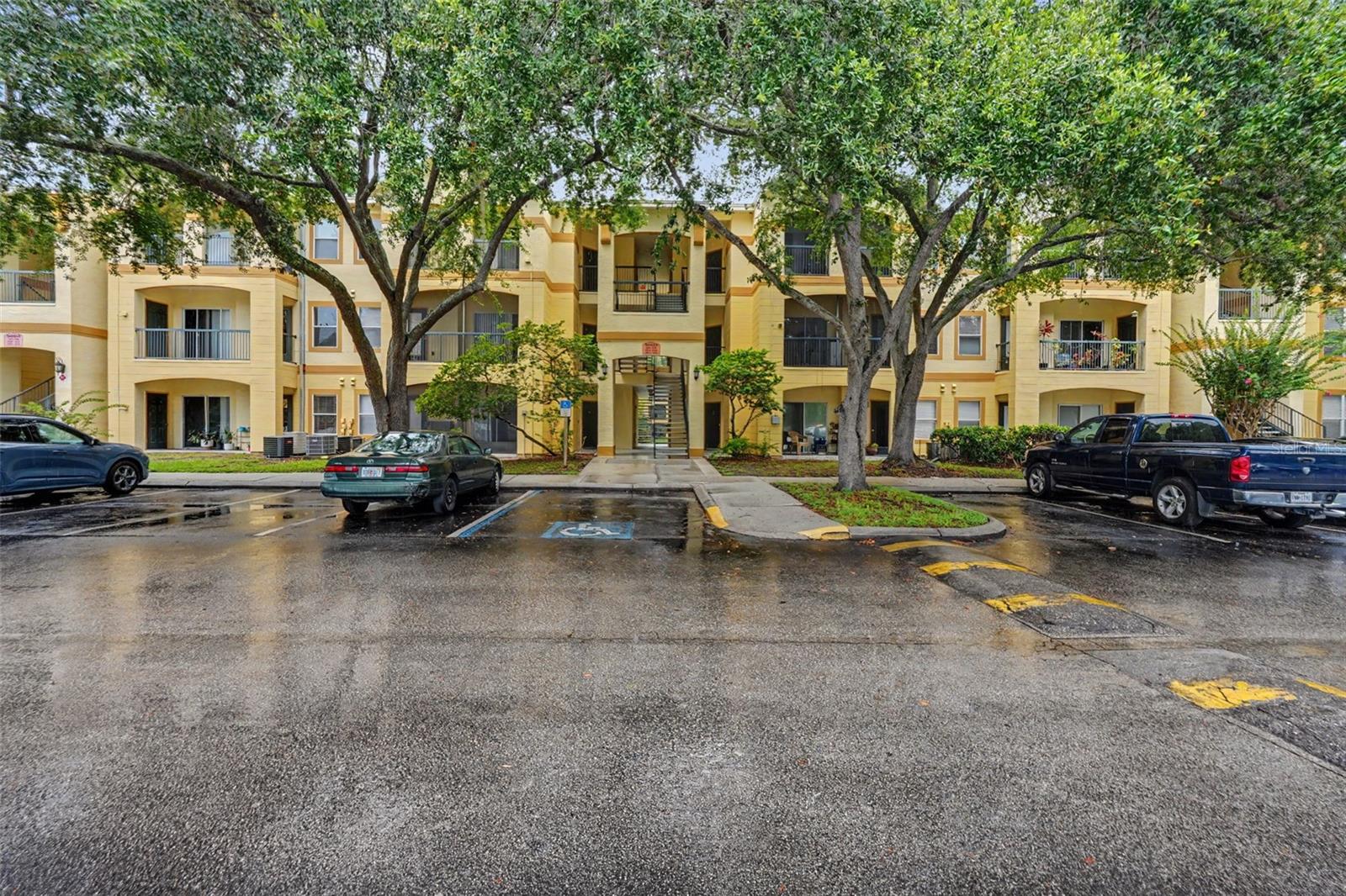 Welcome to this charming one-bedroom, one-bathroom condo located in the desirable gated community of The Pinnacle in Carrollwood. This inviting residence offers a comfortable layout,serene pond views, convenient amenities, and a prime location close to shopping, dining, and entertainment. Step inside to a welcoming living space featuring carpet flooring throughout and a functional kitchen and family room combination that creates an open and comfortable atmosphere. The kitchen offers matching appliances, ample cabinet space, and easy access to the main living area—perfect for everyday living and entertaining. The spacious bedroom provides a relaxing retreat with a generous walk-in closet offering plenty of storage space. The bathroom is conveniently located and completes this well-designed floor plan. Residents of The Pinnacle enjoy a variety of community amenities, including a fitness center, sparkling community pool, gated entry, and sidewalks for added convenience and enjoyment. The community’s excellent Carrollwood location places you near shopping, restaurants, and the popular Citrus Park Mall, making daily errands and entertainment easily accessible. Whether you're a first-time buyer, downsizing, or searching for an investor-friendly opportunity, this condo is an excellent option. With its desirable location, low-maintenance lifestyle, scenic pond views, and strong rental appeal, this property offers outstanding value for both homeowners and investors alike. Schedule your private showing today and discover all that The Pinnacle has to offer!