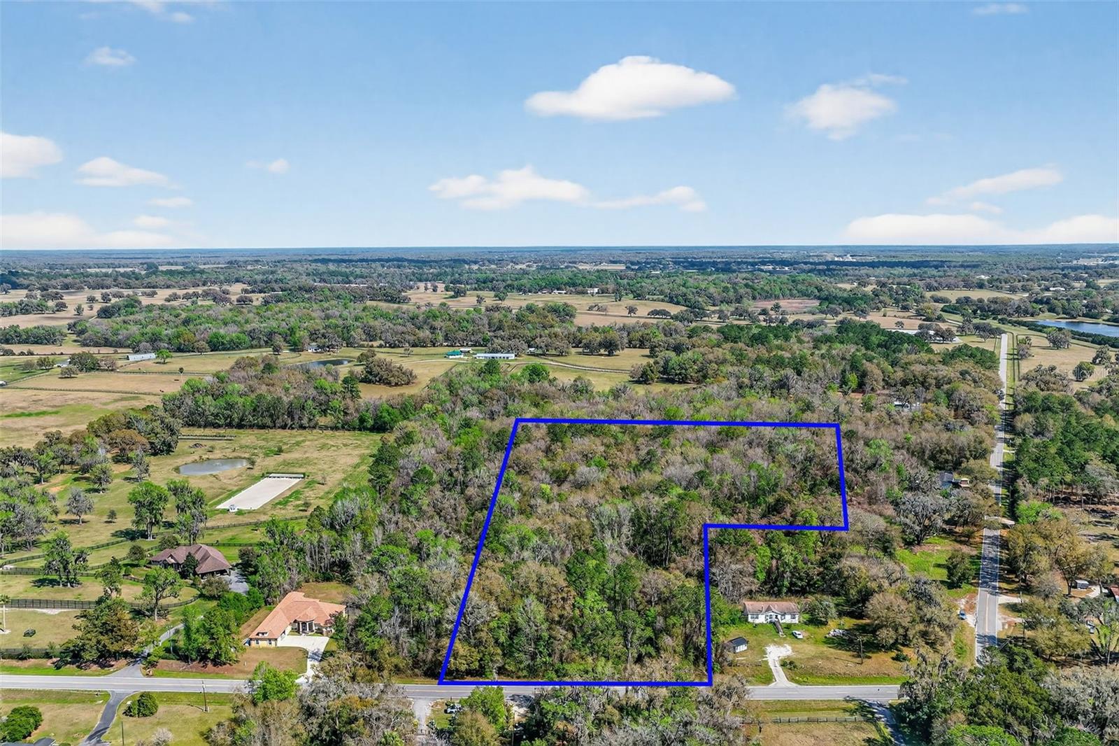 Rare opportunity to own 11.5± acres in Reddick along the desirable 225A corridor in NW Marion County horse country. Offered as two parcels being sold together, this wooded and private Agricultural property is the perfect setting to build your dream home, create a mini farm, bring your horses, and enjoy the space, privacy, and country lifestyle that make this area so special. With electric nearby and just a short drive to the World Equestrian Center, this property offers the best of Marion County living—natural beauty, flexibility, and room to create something truly your own.