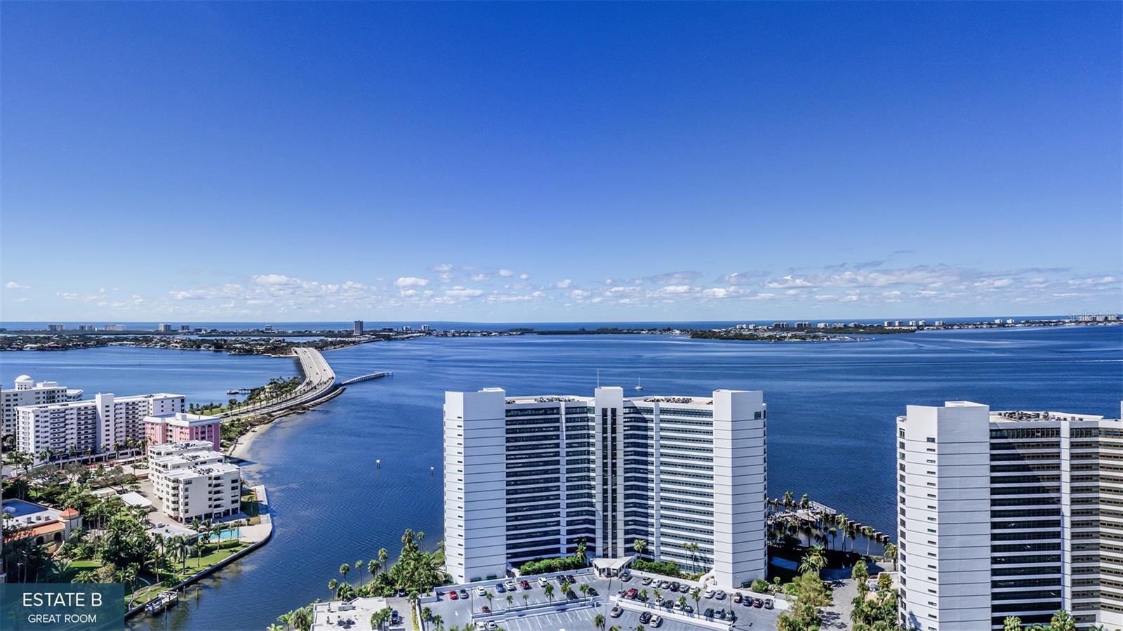 One or more photo(s) has been virtually staged. Pre-Construction. To be built. Prepare to be wowed. This 20-story Ritz-Carlton Residences tower under construction, enjoys a prime waterfront location in the heart of Sarasota's accessible downtown cultural district. Estate 1804 with 13-foot ceilings optimizes beautiful vistas of Quay Harbor, The Bay Park, Sarasota Bay and Gulf of Mexico. Its impressive Estate Residence E design features soaring walls of glass that create an expansive and luxurious great room experience. This spacious area is accentuated by a wraparound terrace with a summer kitchen. The primary bedroom offers a breathtaking bay view through your own private terraced space, complemented by two generous walk-in closets. The spa-style bath boasts a deep soaking bathtub, a double shower and double vanity. Additionally, two guest bedrooms each come with private en-suite baths and access to separate east-facing terraces. In the Ritz Carlton global tradition of peerless service, this private residence will enjoy a dedicated on-site team that takes pride in anticipating every need and fulfilling every wish. A 24-hour dedicated staff and concierge, food and beverage services available from private, on-site service kitchen, dedicated 24-hour valet, housekeeping services and an impressive array of private amenities overlooking the sparkling yacht harbor. In addition to the exceptional private amenities and services available exclusively to our tower residents, membership in The Harbor Club provides access to nearly 20,000 square feet of amenities dedicated to socializing, health and wellness.
