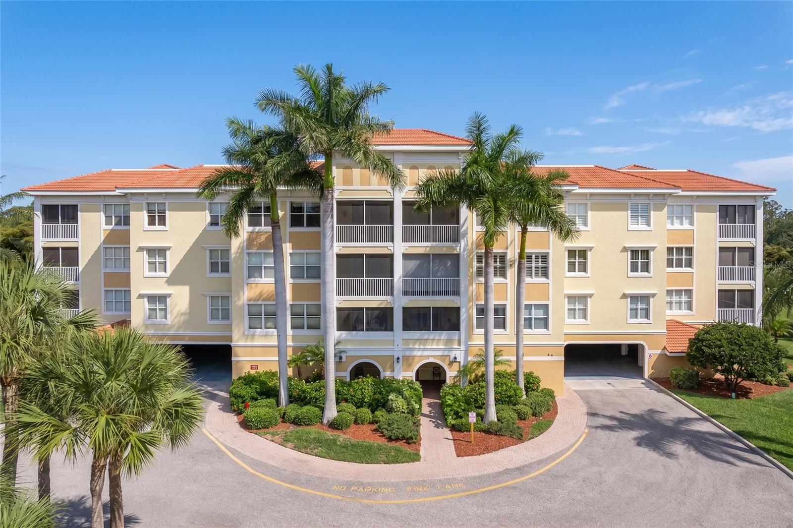 FOUNTAIN COURT CONDO IN PGI W/RESORT-LIKE AMENITIES - This 3 bed/2 bath condo at Fountain Court, a gated condo complex in Punta Gorda Isles, features HURRICANE PROTECTION w/PGT impact-resistant windows. The Cormorant floor plan boasts just over 2,000 sqft of living space including a formal dining area, large kitchen & spacious open living room w/sliding glass doors leading out the screened lanai. The kitchen offers granite counters, a textured subway tile back splash, stainless steel appliances as well as ample cabinet & counter space. Laundry area boasts full-sized, stacked HE washer & dryer. Inside, the unit has tile flooring throughout the main living areas, the 3rd bedroom/den & bathrooms plus tray ceilings in living room, dining room & master bedroom. Tiled lanai has a great view - overlook the private pond from your lanai. The master suite has private access to the lanai, two closets including a large walk-in closet & a private master bath w/dual sinks, glass-enclosed corner shower & separate tub. The large guest rooms are perfect for hosting out-of-town guests. Currently, one of the guest rooms is utilized as a home office/den. Security system was updated in the summer of 2025. Unit comes w/one assigned parking space under the building w/a large storage unit. There is ample guest parking on site. Each building offers a scenic, interior courtyard w/an eponymous fountain. The tranquil courtyard within each building is just the beginning when it comes to complex amenities. Fountain Court boasts an active social scene w/frequent gatherings allowing residents to truly get to know their neighbors. The amenities at Fountain Court are numerous including a beautiful clubhouse w/large meeting space, caterer's kitchen, library, fitness center, billiards & card rooms. Outside of the clubhouse, you'll find the huge, heated pool, spa, barbeque area, plus recently resurfaced pickleball & tennis courts. Enjoy the social setting of an active community that enjoys utilizing all of the amenities. Condo complex had new roofs installed in 2024. Just outside the gates, miles of sidewalks connect you to all parts of Punta Gorda Isles. Easily reach historic downtown, the new library, the PGICA building, the Ring Around the City walking/biking trail or even Fishermen's Village or Isles Yacht Club. Make an appointment today.