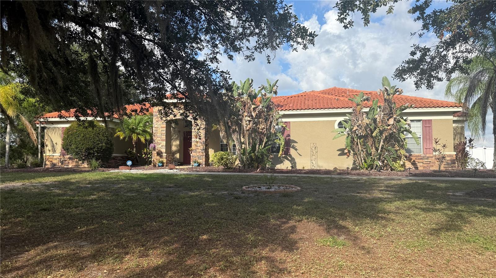 Photos coming soon! Motivated seller! Experience the perfect blend of space, privacy, and modern updates in this exceptional lakefront home located within a gated community in South Hillsborough County. Situated on a sprawling 1+ acre corner lot with no backyard neighbors, this property offers a peaceful setting with plenty of room to enjoy Florida living.
Featuring over 3,700 square feet, this spacious residence boasts 4 bedrooms, 3.5 bathrooms, a dedicated den/home office, living room, dining room, family room,  breakfast nook, and a 3-car garage. The gourmet kitchen is designed to impress with stainless steel appliances, a large center island, and updated cabinetry, making it ideal for both everyday living and entertaining.
This move-in ready, worry-free home has been meticulously maintained and extensively updated, including a new roof (2026), new AC system (2025), septic system serviced (2025), new water softener (2023), new washer and dryer (2024), new refrigerator and dishwasher (2024), updated Wi-Fi irrigation system (2026), new ceiling fans (2025), updated exterior lighting (2025), new Wi-Fi smart garage door opener, and a vinyl dog run fence (2024).
Step outside and enjoy the privacy and endless possibilities this oversized homesite provides. With plenty of room to add a pool, create your own backyard oasis and fully embrace the Florida lifestyle. Enjoy the beautiful conservation easily accessible from the community, walking trails and kayak in the community lake.  Conveniently located near shopping, dining, and major commuter routes, this beautifully updated home offers the rare combination of acreage, privacy, and modern conveniences you've been searching for. Low HOA and No CDD, schedule your private showing today!