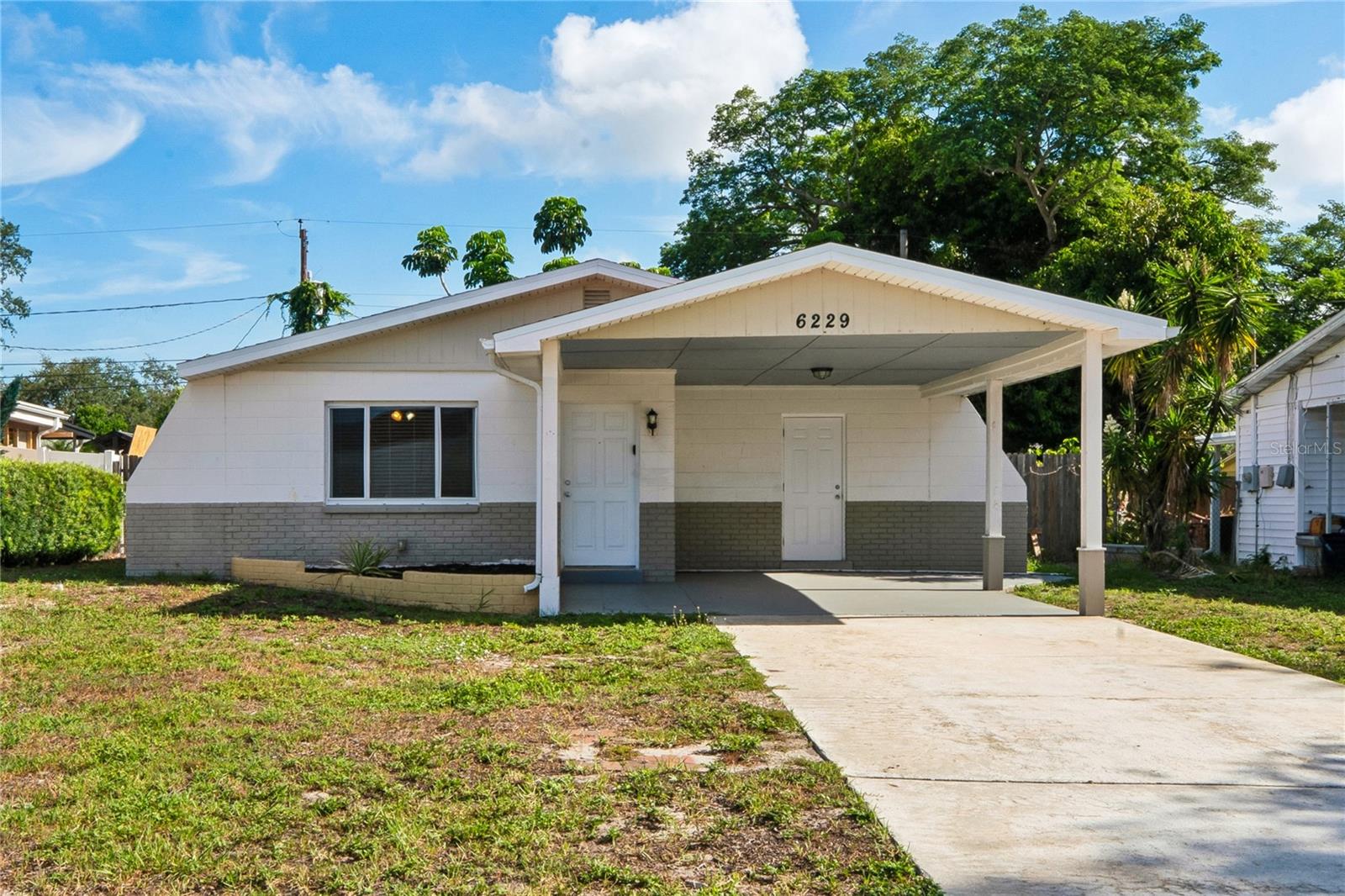 Welcome to 6229 50th Ave N! This 3-bedroom, 1-bathroom home offers almost 1,000 sq ft of living space. Step inside the foyer to find modern paint and a combination of luxury vinyl plank and tile flooring throughout the home. The layout features a dedicated dining area and spacious living room that connect seamlessly to the kitchen—complete with granite countertops and stainless steel appliances. You can also enjoy having a dedicated laundry room right off of the kitchen. The primary suite boasts direct access to the fenced-in backyard, and all bedrooms share a full bathroom with a tiled shower-tub combo. Conveniently located near schools, shopping, and major roadways. Call to schedule a showing today!