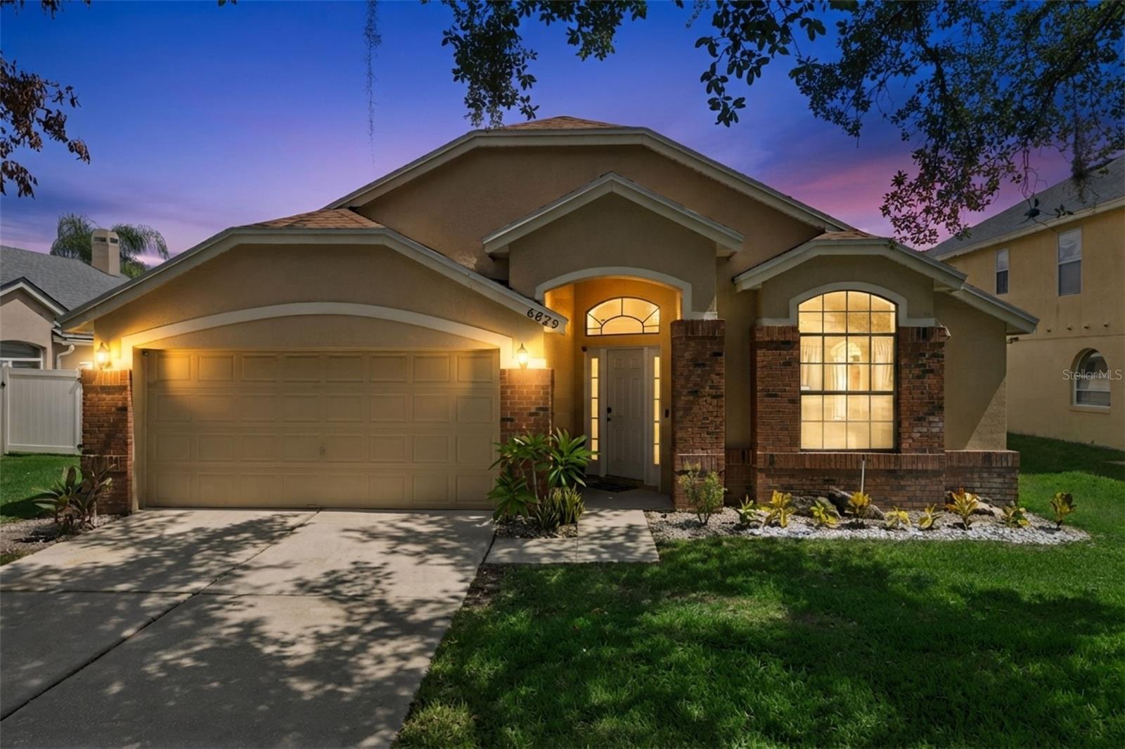 Are you ready to add the most important key to your keychain?  Conveniently located in the heart of Dr. Phillips, minutes from the infamous Restaurant Row, Universal Studios & Islands of Adventure, and the new Epic Universe....6629 Winder Oaks Blvd is one home that you will not want to scroll past.  Once across the threshold you can immediately appreciate all the care and updates the sellers have added.  A formal living room and dining room are located in the front portion of the home, and would make the ideal space for some of those formal gatherings and holiday dinners.  The expansive primary bedroom is located away from the common areas for added privacy, and has its own en-suite bathroom with a separate bathtub and shower, as well as a large walk-in closet.  Three other generously-sized bedrooms are located on the opposite side of the home and are serviced by their own (well updated) full bathroom; each includes walk-in closets and ceiling fans.  Do you like to entertain?  Are you normally the "go-to" house for family gatherings, holidays and birthdays?  If you answered yes, then this kitchen will make you the envy of everyone from here on.  New quartz countertops are complimented by a celtic-blue subway tile backsplash, stainless steel appliances, and an abundance of cabinet space for storage.  Your new kitchen overflows into the family room, where you can converse with your guests & family and host countless gatherings.  Do you need more space?  Do you enjoy sitting outside on those cool mornings or afternoons to have a cappuccino or an evening cabernet....well this massive screened-in lanai is the exact place where you can enjoy those moments.  Entirely covered to protect you from the elements, this colossal lanai spans the width of the home and could be the backdrop for many memories to come for you and your family. PROPERTY HIGHLIGHTS > NO REAR NEIGHBORS | LOW HOA | NEW ROOF IN 2022 | UPDATED KITCHEN WITH QUARTZ COUNTERTOPS | NEWLY PAINTED INSIDE | 2024 WATER HEATER | 2019 HVAC | NOT ONE STITCH OF CARPET IN THE ENTIRE HOME > ALL LAMINATE.  Don't you deserve to be a homeowner in 2026?