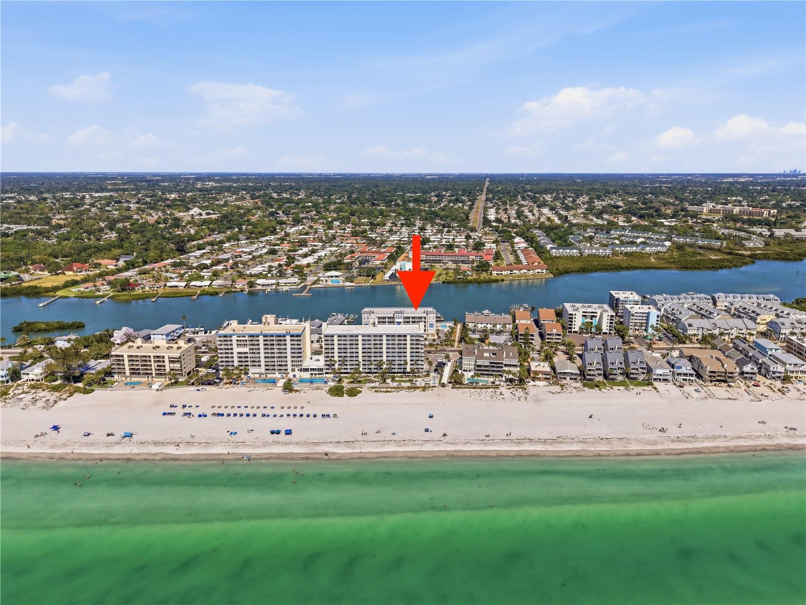 Stunning,Waterfront condo.Located in a gated intracoastal community directly across the street from the beach.Discover elevated coastal living at The Anchorage completed in 2022 in Indian Shores.
This professionally designed 3-bedroom, 2-bath residence offers the perfect blend of modern luxury, coastal elegance, and effortless beach access just across the street.
Inside, the bright open floor plan is enhanced by coastal plank ceramic tile flooring, refined finishes, and thoughtfully curated designer details throughout.
The spacious living and dining areas flow seamlessly to an expansive 30-foot-wide waterfront balcony, creating an ideal setting for morning coffee, sunset cocktails, or outdoor dining overlooking the water.
The sophisticated kitchen is both stylish and functional, featuring stone countertops, GE Café stainless steel appliances, under-cabinet lighting, and abundant workspace for entertaining.
Custom touches including faux wood beam accents, decorative wall detailing, designer lighting, and upscale treatments add warmth and character to the home.
The primary suite is a peaceful waterfront retreat with direct balcony access and wide water views.
Its spa-inspired bath features dual sinks, stone countertops, and an oversized walk-in shower with frameless glass enclosure.
The second bedroom enjoys a Gulf-facing view, while the third bedroom offers flexibility for guests, a home office, or additional sleeping space.
Additional conveniences include in-unit laundry and extra interior storage.
The Anchorage is an intimate community of only 21 residences surrounded by lush tropical landscaping and resort-style amenities.
Residents enjoy a formal secured lobby, high-speed elevator access, heated pool and spa, grilling and lounge area, fishing dock, and gated entry.
This residence also includes two reserved parking spaces, one under the building and one in front.
A park area nearby offers a pleasant green space for a stroll, while the Gulf beach is only steps away.
With a 30-day minimum rental policy allowing limited short-term use, this is an exceptional opportunity for personal enjoyment or seasonal coastal living.
Refined, relaxing, and perfectly positioned between the Intracoastal and the Gulf, this Indian Shores residence captures the very best of waterfront living.