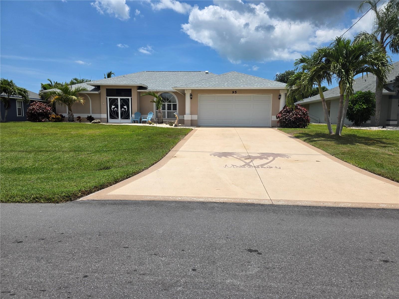 Welcome to your Florida paradise in the highly sought-after community of Rotonda West! This beautifully updated 3-bedroom, 2-bath home offers 1,680 square feet of living space with a desirable split-bedroom floor plan, soaring vaulted ceilings, crown molding, and beautiful tile flooring throughout. A screened double-door entry welcomes you into the bright, open living area designed for comfortable everyday living and effortless entertaining.

The heart of the home is the fully remodeled kitchen featuring gorgeous granite countertops, a breakfast bar, additional counter space perfect for a coffee bar or serving station, abundant storage, and all-new stainless steel appliances. Custom wood plantation shutters accent the front and rear windows, while ceiling fans throughout the home—including the lanai—provide year-round comfort.

Step outside to your private backyard retreat where the heated saltwater pool has been transformed into a true resort-style oasis. Resurfaced in 2023, the pool features premium perimeter tile, stunning abalone shell flecks that create an iridescent shimmer, an expanded coping sun shelf with a fountain nestled between two high-end Polywood lounge chairs, and a new variable-speed pool pump. The entire pool cage was replaced in 2023, complementing the new roof installed the same year. Just outside the screened enclosure, an open patio provides the perfect space for grilling, entertaining, or relaxing under the Florida sunshine. Accordion hurricane shutters protect the lanai for added peace of mind.

Situated on 80 feet of freshwater canal frontage, the property is surrounded by mature trees and lush tropical landscaping, creating a peaceful and private setting. The irrigation system draws directly from the canal, helping maintain the beautiful lawn while reducing water costs.

Additional highlights include a low HOA fee, desirable Flood Zone X, and an open-concept layout with exceptional flow throughout the home.

Ideally located just minutes from Englewood Beach, Boca Grande, and Manasota Key, you'll enjoy some of Southwest Florida's most beautiful Gulf beaches, world-class boating and fishing, championship golf courses, and the charming boutiques, restaurants, farmers markets, and year-round events along historic Dearborn Street in downtown Englewood. This move-in ready home offers the perfect combination of luxury, comfort, and the Florida lifestyle you've been dreaming of.