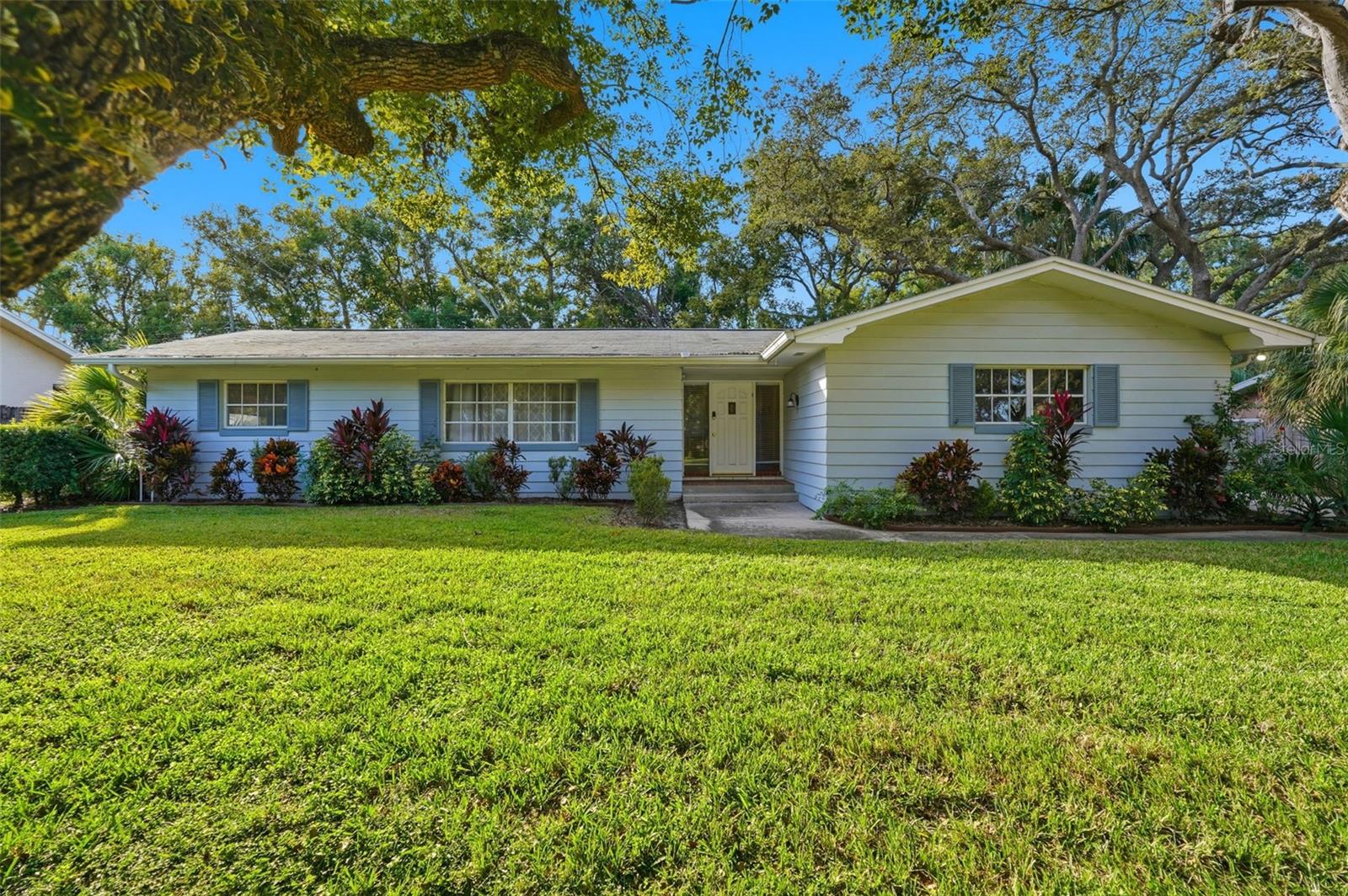 Available for long-term lease, this beautifully renovated and fully furnished 4-bedroom, 2-bathroom pool home is tucked away on a quiet dead-end street in the heart of Clearwater. Situated on a spacious lot, this home offers the perfect blend of comfort, style, and Florida living.

Step inside to a bright, open floor plan featuring wood-look vinyl flooring throughout, a cozy fireplace with custom built-in shelving, and a spacious kitchen with granite countertops, open shelving, a breakfast bar, and seamless flow into the dining and living areas—ideal for everyday living and entertaining.

The primary suite features a private en suite bathroom with a double-sink vanity, while both bathrooms have been tastefully updated with granite countertops and walk-in tile showers with rain showerheads.

Enjoy your own private backyard oasis with a screened-in lanai, heated pool with waterfalls, sauna, covered pergola, fire pit, fruit trees, and large fenced front and backyard—perfect for relaxing or entertaining year-round.

Conveniently located just minutes from BayCare Ballpark, Clearwater Country Club, parks, shopping, and dining, and only about 20 minutes from world-famous Clearwater Beach. This exceptional move-in-ready home offers everything you need to enjoy the best of the Florida lifestyle. Schedule your private showing today!