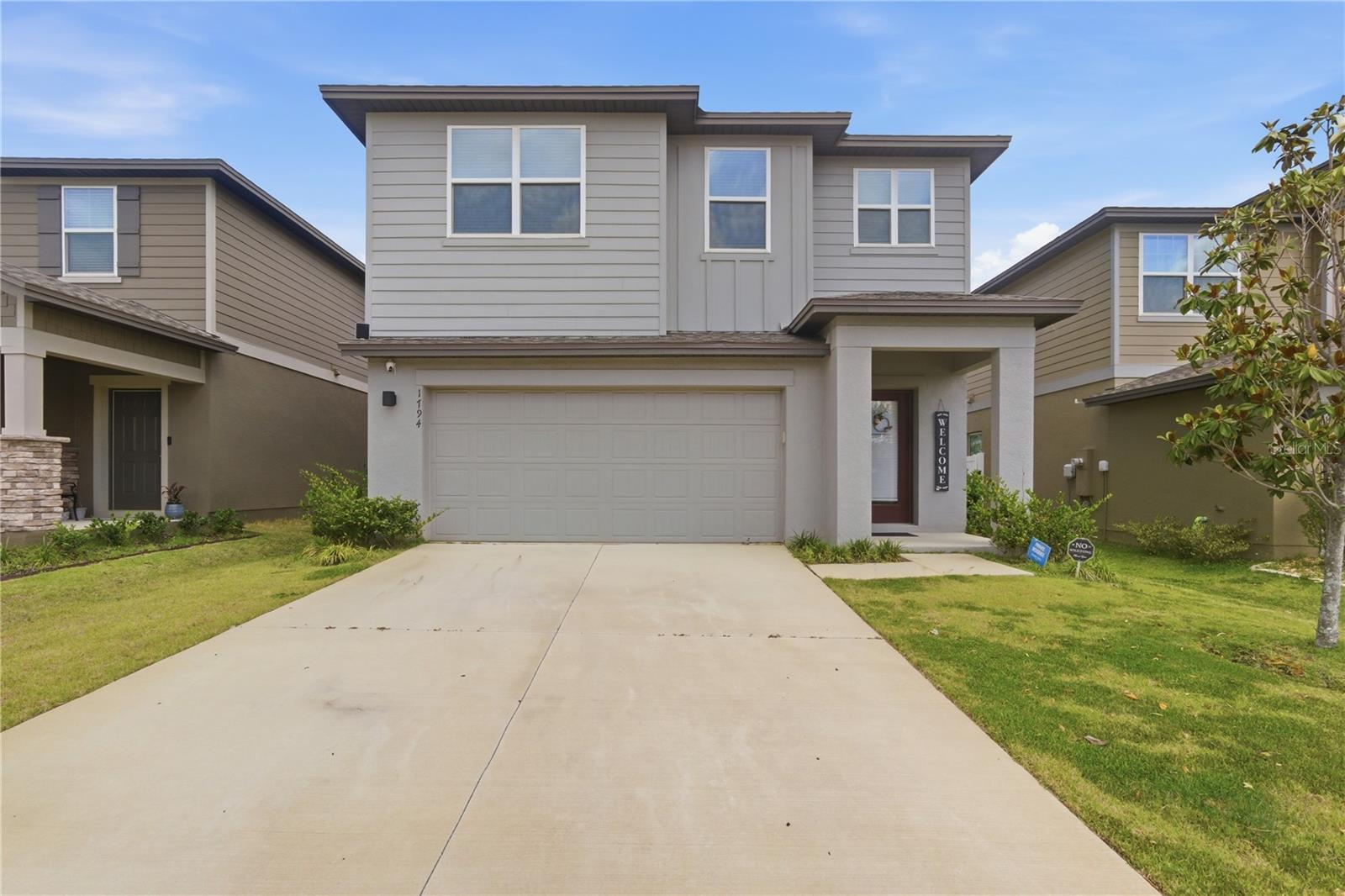 Recently built Single-family home in the exclusive and very well-located community of the Villages at Minneola Hills blends modern architecture with energy-efficient design in 3 spacious bedrooms and 2.5 baths.The thoughtful open-concept layout connects the kitchen, dining, and living areas runs vinyl flooring through the main living areas, and neutral finishes enhance the bright kitchen showcases 42-inch cabinets, granite countertops, stainless-steel appliances, a pantry, and a large island with bar seating, perfect for entertaining or casual meals. Upstairs, a flexible loft that can be used as an office or a guest retreat, and the primary suite that includes a spacious walk-in closet, dual vanities, and a glass-enclosed shower. The 2 additional bedrooms and a full bath, and the laundry room completes the family private space. Residents of Villages at Minneola Hills enjoy a resort-style pool, clubhouse, playground, dog park, and sidewalks throughout the community. Conveniently located less than 2mi of Publix and Florida’s Turnpike, minutes from downtown Clermont, Lake Minneola Trail, shopping, and dining. FURNITURE INCLUDED!