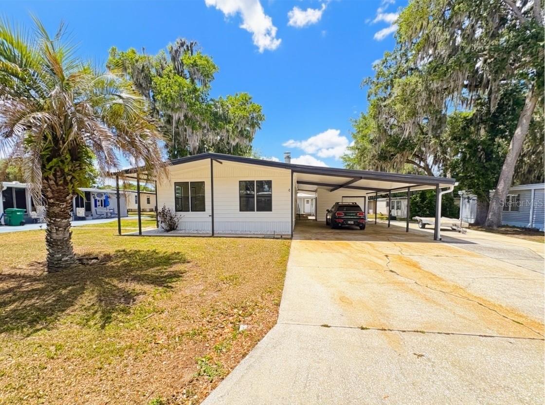 Step into this beautifully renovated 2-bedroom, 2-bath home offering over 1,250 square feet of thoughtfully designed living space. From the moment you enter, you’ll appreciate the bright, open feel of the spacious living and dining room combination—perfect for both relaxing and entertaining.
The heart of the home is the large, updated kitchen, featuring a stunning butcher block center island, ample counter space, and abundant storage. Its open layout flows seamlessly into the main living areas, creating a warm and inviting atmosphere filled with natural light.
Both bedrooms are impressively oversized and include walk-in closets, providing exceptional storage and comfort. The primary suite is truly a standout, boasting not one—but two—walk-in closets, one of which is so expansive it can easily double as a private office or flex space. The second bedroom features a convenient Jack-and-Jill bath, giving it the feel and functionality of a second master suite.
Additional highlights include an interior utility room with extra storage, adding everyday convenience, and a charming electric fireplace that brings warmth and character to the living space.
Situated on a generously sized lot just moments from the golf course, this home offers both tranquility and accessibility. With its blend of modern updates, spacious design, and prime location, this property is a rare find you won’t want to miss.
The community is absolutely gorgeous with countless amenities, which include: large swimming pool with hot tub, 18 hole championship golf course, driving range and putting greens, shuffleboard, tennis, pickle ball, fitness center, iibrary, billiards room, softball field, and a 5 star restaurant and lounge. What more can you ask for? This is a beautiful home in a beautiful community. You won't be disappointed!!!!