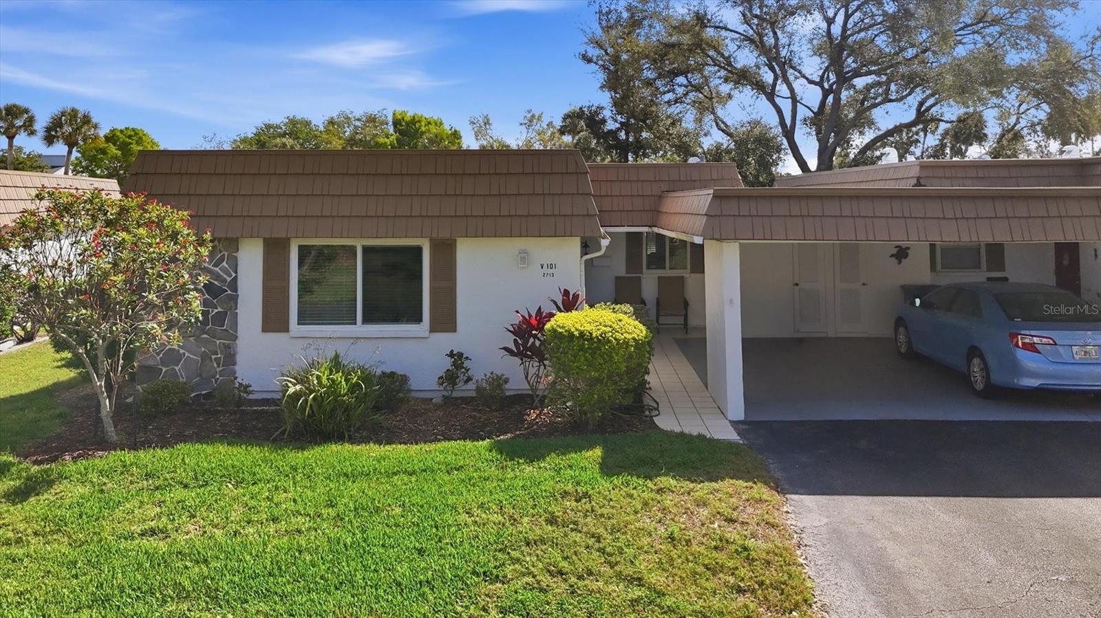 Welcome to Strathmore Riverside-perfectly positioned in the heart of Sarasota, where fun and an active lifestyle meet coastal charm! Step inside this stunning villa, fully remodeled from top to bottom with great attention to detail. The open-concept floor plan has been thoughtfully redesigned to include expanded closet space in the primary suite and a beautifully updated, more spacious bathroom. The kitchen now overlooks the living area with walls removed to create a bright, airy space that’s perfect for both relaxing and entertaining. The many updated features include hurricane impact windows, handsome Brazilian teak wood floors throughout, new 5" baseboards, new interior paint, solid-core doors, skip-troweled ceilings, new door hardware, lighting, receptacles & switches, and crown molding throughout. The kitchen has been completely opened up and features a kitchen island in an offsetting color, granite tops, neutral raised-panel cabinetry, and brand-new stainless appliances. Behind the scenes, this villa has been replumbed and new A/C ductwork installed. There is a one-car carport and a large outside laundry room/workshop. The location in this 'Over-55' community of 336 villas is only a very short walk away from the community center with clubhouse, heated/cooled swimming pool to an average of 85 degrees year-round, billiards, exercise room, and boat docks. There are so many organized social outings and gatherings to keep you happy, engaged, and busy! This well-run community is 2.5 miles to a Siesta beach access, 4.5 miles to downtown Sarasota, and is conveniently surrounded by walkable restaurants, grocery, shopping, and so much more. This location has it all and this villa will absolutely not disappoint. Stop by today.