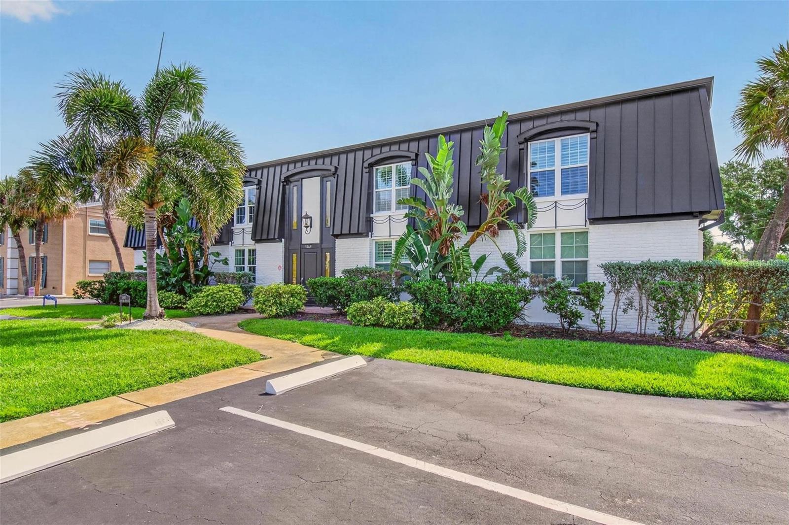 Step into a lifestyle of effortless coastal elegance at 1065 Eden Isle Unit 2. This isn't just a renovation; it’s a complete reimagining of space, where every square inch has been thoughtfully updated to meet a warm aesthetic.

The heart of this two-bedroom, two-bathroom retreat is undoubtedly the kitchen. Designed for those who appreciate the finer details, it boasts stunning custom cabinetry that offers as much style as it does storage. Including a small butlers pantry with full size wine fridge and more storage. Whether you’re prepping a quick brunch or hosting friends for happy hour, the seamless flow into the living area ensures you’re always part of the conversation.

Both bathrooms have been transformed into spa-like sanctuaries with contemporary finishes that make your morning routine feel like a luxury. In addition there is also a flex space just off the kitchen that can be used as a home office with all the cabinet built ins ready for you. Full washer/dryer laundry room and covered carport space also included.

Located in a community that feels like a hidden gem, this unit offers the perfect balance of quiet privacy and proximity to everything you love. It’s rare to find a home where all the hard work has already been done for you—all that’s left is to move in, unpack, and start enjoying the Snell Isle life.