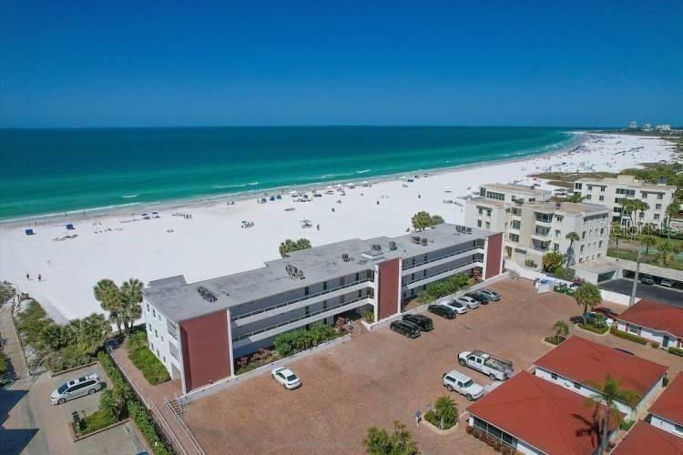 Positioned along the powdery white sands of Siesta Key’s renowned Crescent Beach, this villa residence within Casa Blanca Beach Resort presents an exceptional opportunity to own in one of Sarasota’s most iconic Gulf-front communities. Casa Blanca is a unique collection of individually owned villas and apartments, each thoughtfully furnished and appointed for effortless coastal living or income-producing flexibility, with minimum rental periods of just 5–7 nights depending on ownership preference. This two-bedroom residence is fully equipped with an updated kitchen and bathroom, all cookware and linens, and the conveniences of individually controlled air conditioning, cable television, and Wi-Fi, creating a seamless turnkey experience for both owners and guests. The community enhances the Gulf-front setting with a clubhouse, pool and multiple on-site laundry facilities, all designed to support easy, resort-style living. Set directly on Crescent Beach, internationally celebrated for its fine, quartz-crystal sand and consistently ranked among the top beaches in the United States, this property captures the essence of Sarasota’s coastal appeal. Ideally situated just off Stickney Point Bridge, it offers effortless access to Sarasota’s renowned dining, shopping, and cultural attractions. With Siesta Beach just steps away, this is a rare opportunity to own in a beloved beachfront destination, whether as a personal retreat, full-time residence, or high-demand investment property.