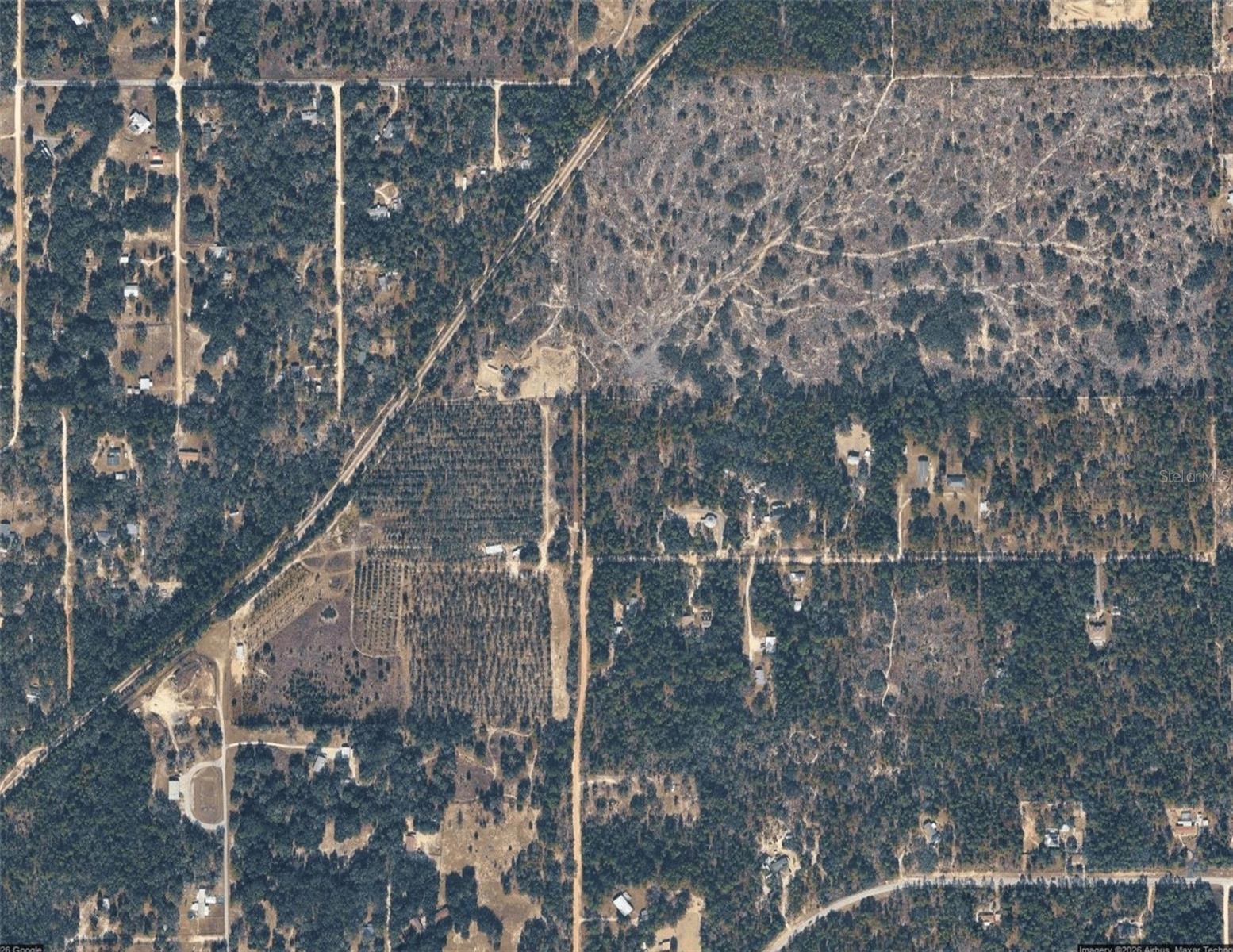 Discover the perfect opportunity to build your dream home on this beautiful 5.1-acre homesite located in the peaceful Dunnellon area of Citrus County. Offering privacy, space, and endless possibilities, this expansive parcel provides the ideal setting for those seeking a tranquil country lifestyle while remaining conveniently close to modern amenities.

Surrounded by Florida's natural beauty, this wooded property offers plenty of room to create your custom estate, private retreat, workshop, recreational storage, or hobby farm. With 5.1 acres at your disposal, you'll enjoy the freedom and flexibility that larger parcels provide while maintaining the privacy that is becoming increasingly difficult to find.

Nature lovers and outdoor enthusiasts will appreciate the abundance of nearby recreational opportunities. Enjoy boating, fishing, kayaking, paddleboarding, and swimming in the crystal-clear waters of the Rainbow River and the world-famous springs of the area. Explore the scenic trails, wildlife, and natural beauty of nearby parks and preserves, or spend the day hiking, biking, horseback riding, and birdwatching throughout the region.

Golf enthusiasts will find several nearby courses, while shopping, dining, medical facilities, and everyday conveniences are easily accessible in both Dunnellon and surrounding communities. The property also offers convenient access to Ocala, Crystal River, and the Gulf Coast, providing even more opportunities for entertainment, dining, and outdoor recreation.

Whether you're ready to build now or invest in land for the future, this exceptional 5.1-acre property offers the space, privacy, and location you've been looking for. Don't miss this opportunity to own a beautiful piece of Florida and create the lifestyle you've always envisioned.