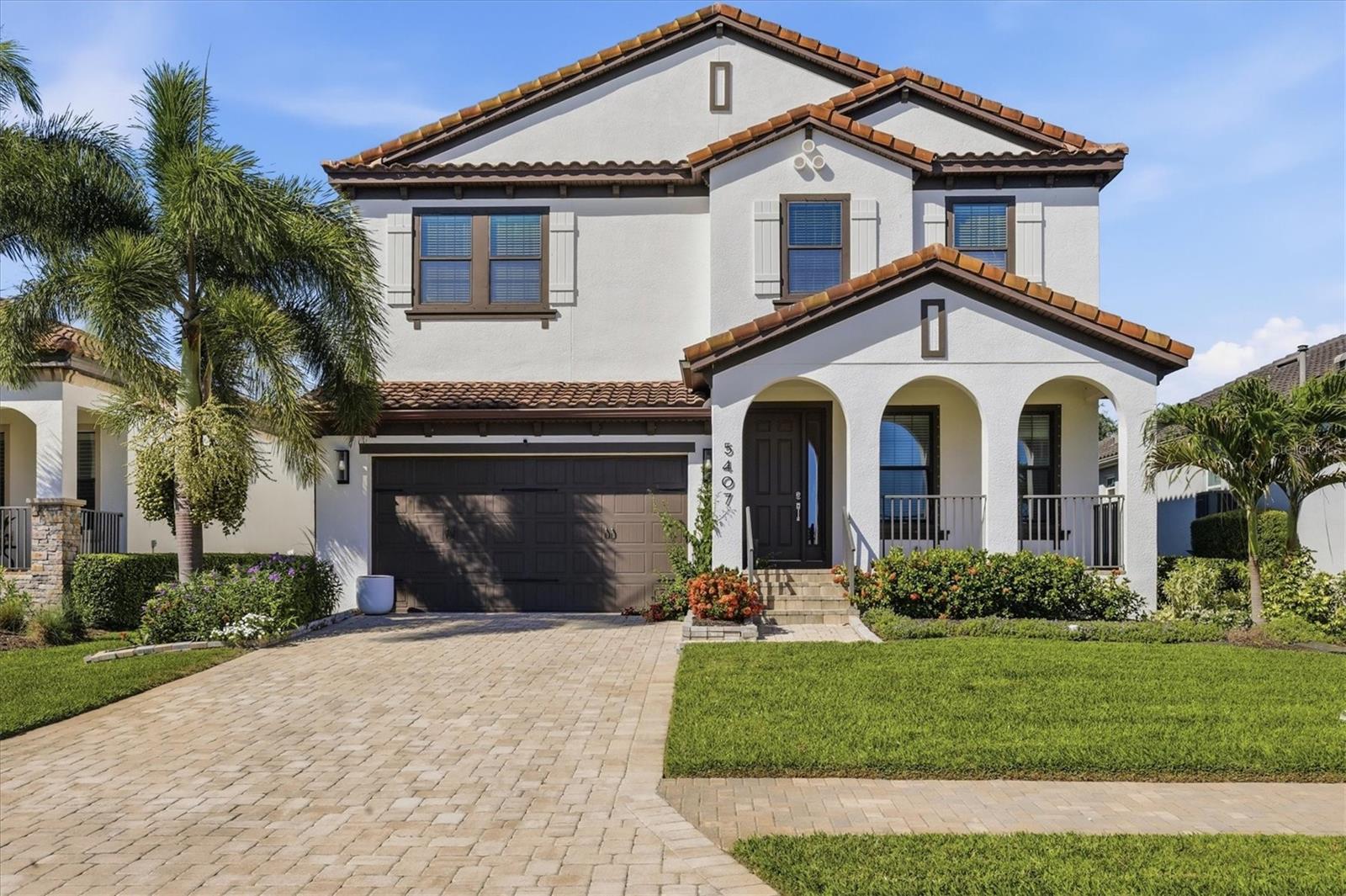 Welcome to your slice of Florida luxury in the highly sought-after gated community of Legends Bay, just minutes from the world-renowned IMG Academy. This beautifully updated 4-bedroom, 3-bath home offers the perfect blend of comfort, style, and functionality in a maintenance-free setting. Step inside to discover a light-filled, open-concept layout featuring fresh interior paint, new carpet, updated trim, and designer lighting throughout. The spacious kitchen is a true centerpiece, showcasing new Pompeii Regalo Quartz countertops, a stylish tile backsplash, Frigidaire appliances, a gas range, and a convenient pass-through pantry that connects to a large walk-in pantry—perfect for everyday living and entertaining. The thoughtfully designed floor plan includes a flex space just off the primary suite, ideal for a home office, gym, or private retreat. The primary suite also offers a unique and practical flow, with direct access to the laundry room through the oversized walk-in closet. Step outside to your private backyard oasis, complete with a brand-new pool, expansive pool deck, and a fully screened lanai enclosure. Enjoy outdoor living at its finest with a complete kitchen featuring a built-in gas grill, beverage refrigerator, and bar seating—perfect for hosting or relaxing under the Florida sun. Residents of Legends Bay enjoy access to a heated community pool, clubhouse, and a guarded gate for added security and peace of mind. This move-in ready home offers the ideal combination of luxury upgrades, smart design, and an unbeatable location. Schedule your private showing today and experience the lifestyle you’ve been waiting for.