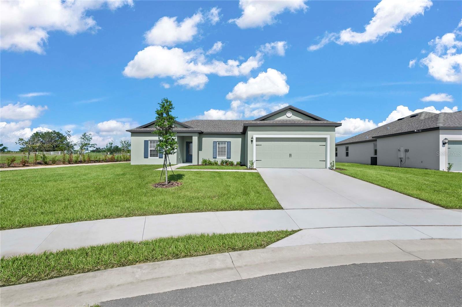 Pre-Construction. To be built. Welcome to the Crane floor plan by LGI Homes, located in the highly sought-after Citrus Place community. This thoughtfully designed single-story home features an open-concept layout ideal for both everyday living and entertaining. The chef-ready kitchen is equipped with granite countertops, a large island, a walk-in pantry, and a full suite of stainless-steel appliances.

Enjoy spacious bedrooms and a private master retreat designed for comfort and relaxation. This home comes complete with the CompleteHome™ Interior Package, including 36” white upper wood cabinets with crown molding, energy-efficient features, and modern finishes throughout. A two-car garage with a Wi-Fi-enabled opener adds everyday convenience, while professional front yard landscaping enhances curb appeal.

Situated on a premium homesite with no rear neighbors, this property offers added privacy—creating a peaceful outdoor space to enjoy and making it the perfect place to call home.  Enjoy exceptional value and lower monthly costs with NO CDD fees in this beautiful community!
