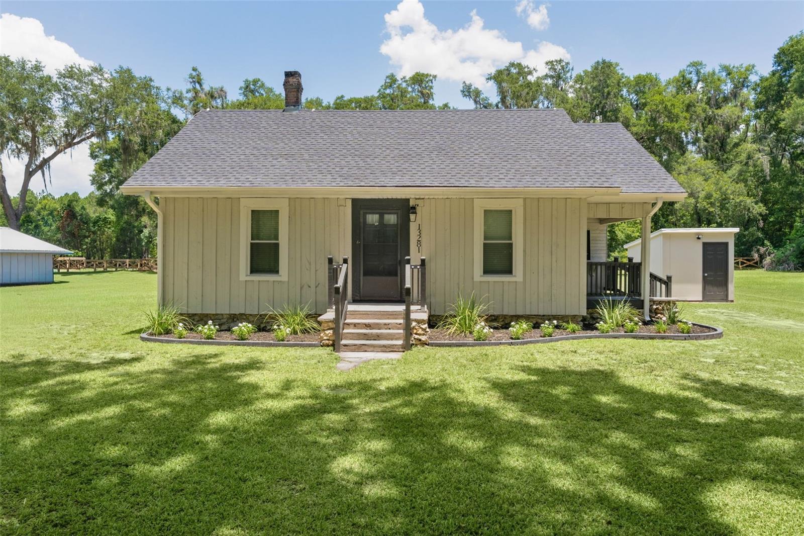 Charming, beautifully updated 2-bedroom, 1-bath home built in 1928, situated on a picturesque 0.69-acre lot . This home blends historic character with modern updates and offers a warm, welcoming feel throughout. Major improvements include a new roof (2025), 2021 HVAC system, and a hot water heater less than 10 years old. The spacious property provides plenty of room to enjoy outdoor living, gardening, or future possibilities. Conveniently located near Lake Weir, this unique home is perfect as a primary residence, weekend getaway, or investment opportunity. Schedule your private showing today!