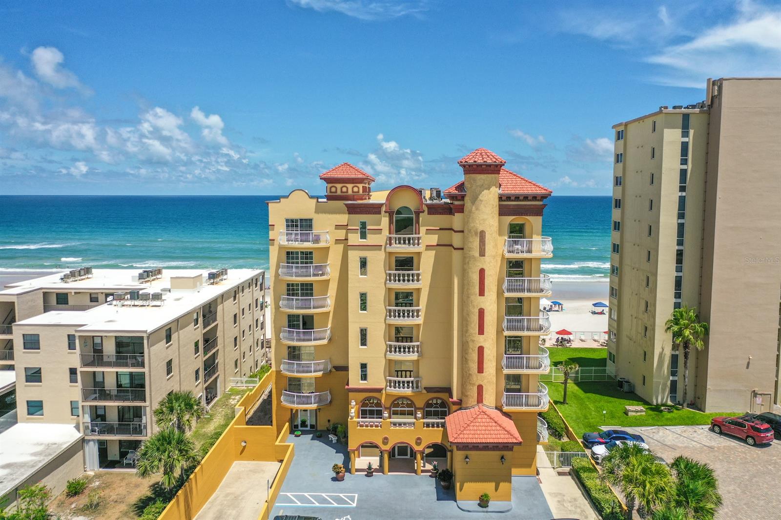 Direct Oceanfront SE Corner Condominium Home with almost 3000 SF of Living Area located on the DRIVE FREE BEACH! 3 Ensuite Bedrooms with Private Balcony access from each Suite! Open Floor Plan flows seamlessly from Kitchen to Dining Area to Living Room and Beyond to the soothing Ocean Views! Spacious Kitchen with Granite Counters, Breakfast Bar, Newer Appliances. Unit has a Wine Room with Wet Bar & Wine Cooler for EZ Entertaining. Work from home in Private Office Space within view of the Ocean. This Boutique Condominium offers residents a beautiful Oceanfront Deck, Pool, Hot Tub, Sauna, Underground Parking & additional Storage. Unit is completely turnkey Furnished. What are you waiting for? Life is better by the Sea! ;Water: City