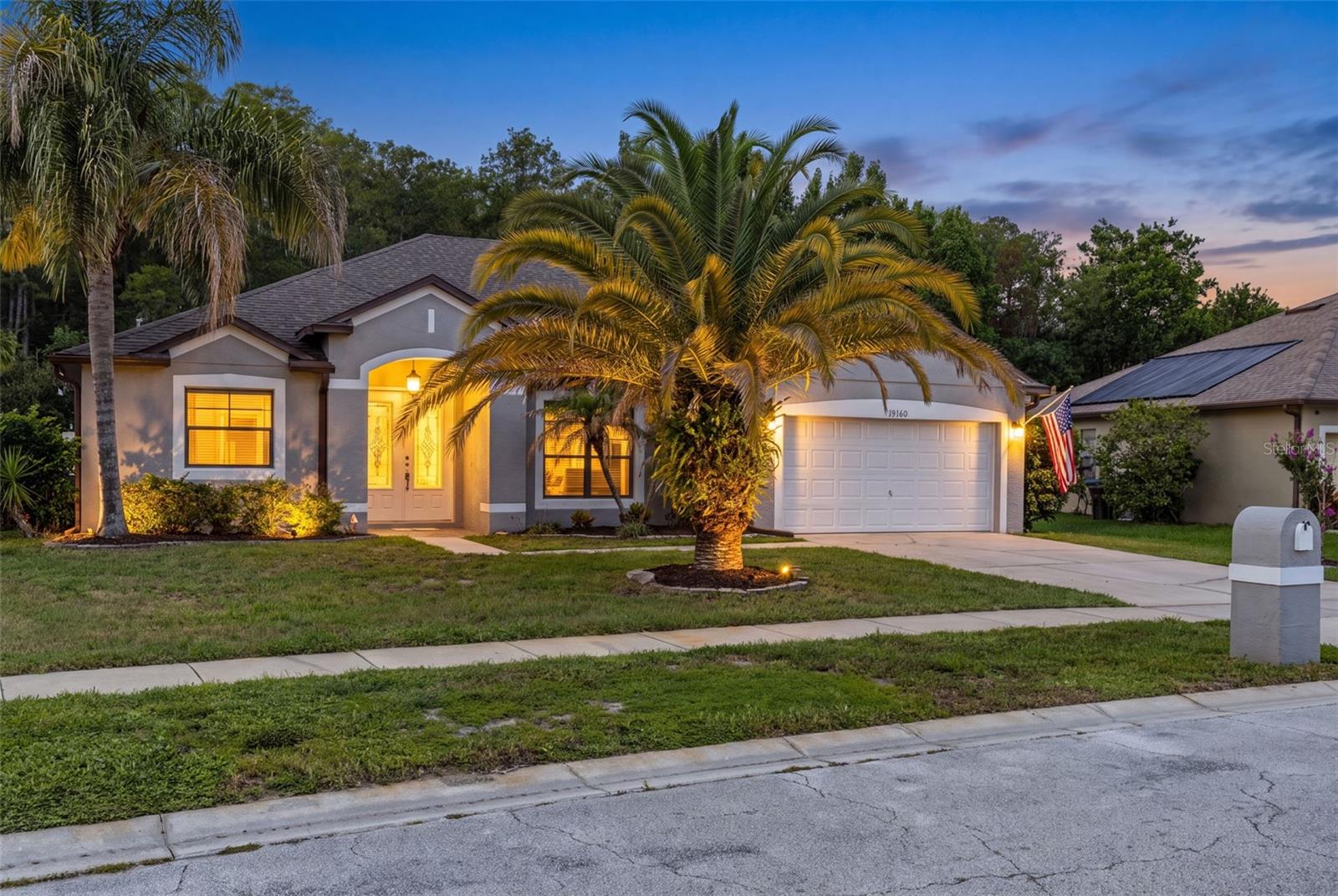 Welcome to an exceptional opportunity to own a beautiful pool home in the gated Reserve at Wedgefield Golf Community, nestled in the peaceful suburbs of East Orlando.

Backing to tranquil conservation, this home offers a private backyard oasis designed for relaxation and entertaining. Enjoy a spacious covered lanai, sparkling screened-in pool, and an expansive pool deck—the perfect setting for morning coffee, weekend gatherings with family and friends, or unwinding after a long day while taking in the serene natural views.

Step inside to discover a bright and inviting open-concept split floor plan that blends comfort and functionality. The welcoming foyer opens to a spacious living and dining room combination, seamlessly flowing into the heart of the home—the kitchen and family room.

Designed with both everyday living and entertaining in mind, the kitchen features solid wood cabinetry, stainless steel appliances, a center island, abundant storage, and a breakfast nook with sliding glass door access to the covered lanai and pool. The adjoining family room is warm and inviting, highlighted by a stunning electric fireplace that creates the perfect ambiance for cozy evenings.

Privately situated on one side of the home, the spacious primary suite serves as a peaceful retreat. It offers direct sliding glass door access to the pool area, allowing you to step outside and enjoy your private oasis at any time. The en-suite bathroom completes the owner's retreat.

On the opposite side of the home, two secondary bedrooms share a full bathroom, which is also conveniently accessible for guests. Near the front of the home, you'll find a versatile fourth bedroom that can easily serve as a home office, study, fitness room, or guest bedroom. A separate laundry room with direct access to the two-car garage adds everyday convenience.

Additional highlights include beautiful laminate flooring throughout most of the main living areas and the primary bedroom, a freshly painted exterior, and a new water heater.

Residents of The Reserve at Wedgefield enjoy access to outstanding community amenities, including community pools, a playground, and athletic fields, providing even more opportunities for recreation and outdoor enjoyment.

Ideally located adjacent to Wedgefield Golf Club and offering convenient access to SR-528, SR-520, and Highway 50, this home places you within easy reach of Downtown Orlando, Orlando International Airport, the Walt Disney World Resort area, Universal Orlando, Florida's Space Coast, and the area's beautiful beaches. Combining peaceful suburban living with exceptional accessibility, this home offers the perfect balance of comfort, convenience, and lifestyle. Whether you're looking for a private retreat, a home designed for entertaining, or a place to create lasting memories, this is one you won't want to miss.
