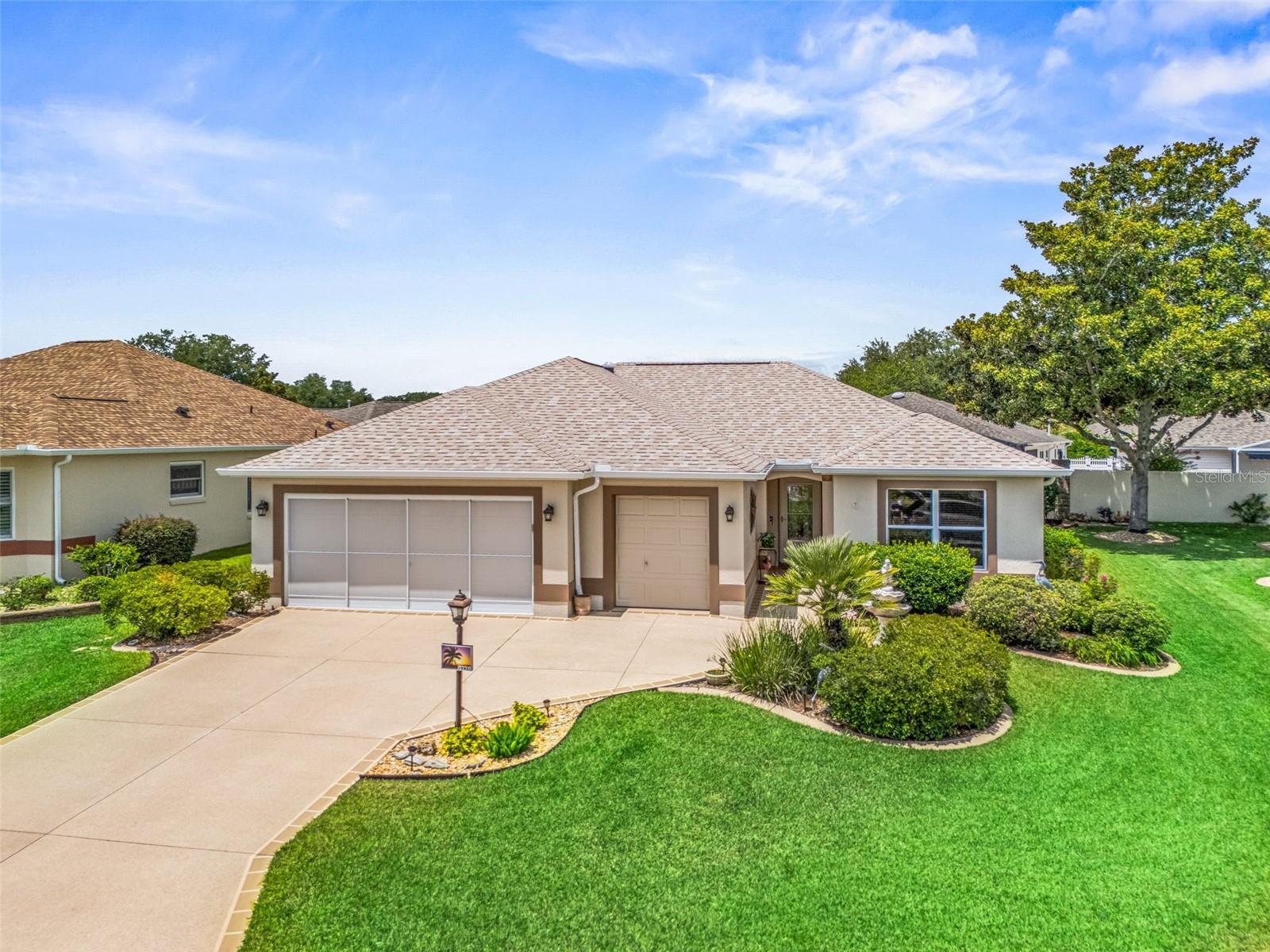 Here's a great opportunity because the works been done!  Bond paid, new HVAC in 2022 and a new roof in 2023 plus many upgrades have been added to this block and stucco 3 bedroom, 2 bath Azalea model home.  Start with a golf cart garage and mini workshop and easy access overhead storage for off season goodies in the garage.  Inside, the solar tubes add lots of extra natural light, the vaulted ceilings contribute to the spacious feeling of this open floor plan. The expanded floor plan features a 4 season den/family rm, a Florida room and a lanai.  There's also a screen room with 'evening shades', overlooking the professionally landscaped back yard featuring your own practice putting green, a patio & grilling area, and a side pet yard.  The a breakfast bar center island with ample storage cabinets is made for on the go living.  The laundry (washer dryer included) has another set of pantry storage cabinets.  Crown molding, Recessed lighting throughout, some new lights and ceiling fans are all part of the upgrades here.  An inviting leaded glass entry door makes this home a stand out.  Near Nancy Lopez golf and country club and a short golf cart ride away from Spanish Springs Square, medical, restaurants, recreation centers and lots of shopping.