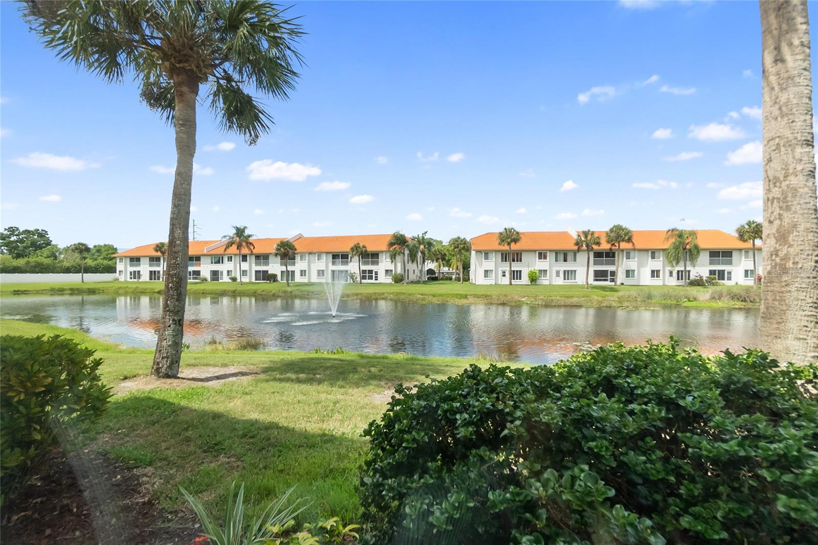 Move-in ready and thoughtfully updated, this beautiful 2-bedroom, 2-bathroom end-unit home offers the perfect combination of comfort, style, and scenic surroundings. 
The inviting interior features an open and airy layout, enhanced by hurricane-impact windows and a hurricane-rated sliding glass door for both safety and peace of mind. Elegant plantation shutters add a refined touch, while a built-in TV with an electric fireplace creates a warm and cozy living area.
The eat-in kitchen is ideal for casual dining offering ample space and functionality. The primary suite serves as a private retreat, complete with a walk in closet and a beautifully updated ensuite bath featuring high-end finishes, including a custom-made vanity sourced from North Carolina. The primary bathroom has been tastefully renovated within the last two years.
Additional major upgrades include a full plumbing repipe, along with a water heater, washer, and dryer all replaced just two years ago—ensuring modern efficiency and reliability.
One of the standout features of this home is the converted, air-conditioned back patio, perfect for use as a sunroom, home office, or additional living space to enjoy year-round comfort while taking in the tranquil lake views.
Located in the desirable Casa Del Sol community, residents enjoy a vibrant lifestyle with amenities including tennis and pickleball courts, shuffleboard, bocce ball, a heated pool for cooler months, and a clubhouse with a pool, poker tables, a gym, books and endless ongoing activities.
Conveniently situated near I-75, this home is just a short drive to Siesta Beach, University Town Center, Waterside, and downtown Sarasota—offering easy access to shopping, dining, and the world-renowned Gulf Coast beaches.
This exceptional home truly offers the best of Florida living—schedule your showing today!
