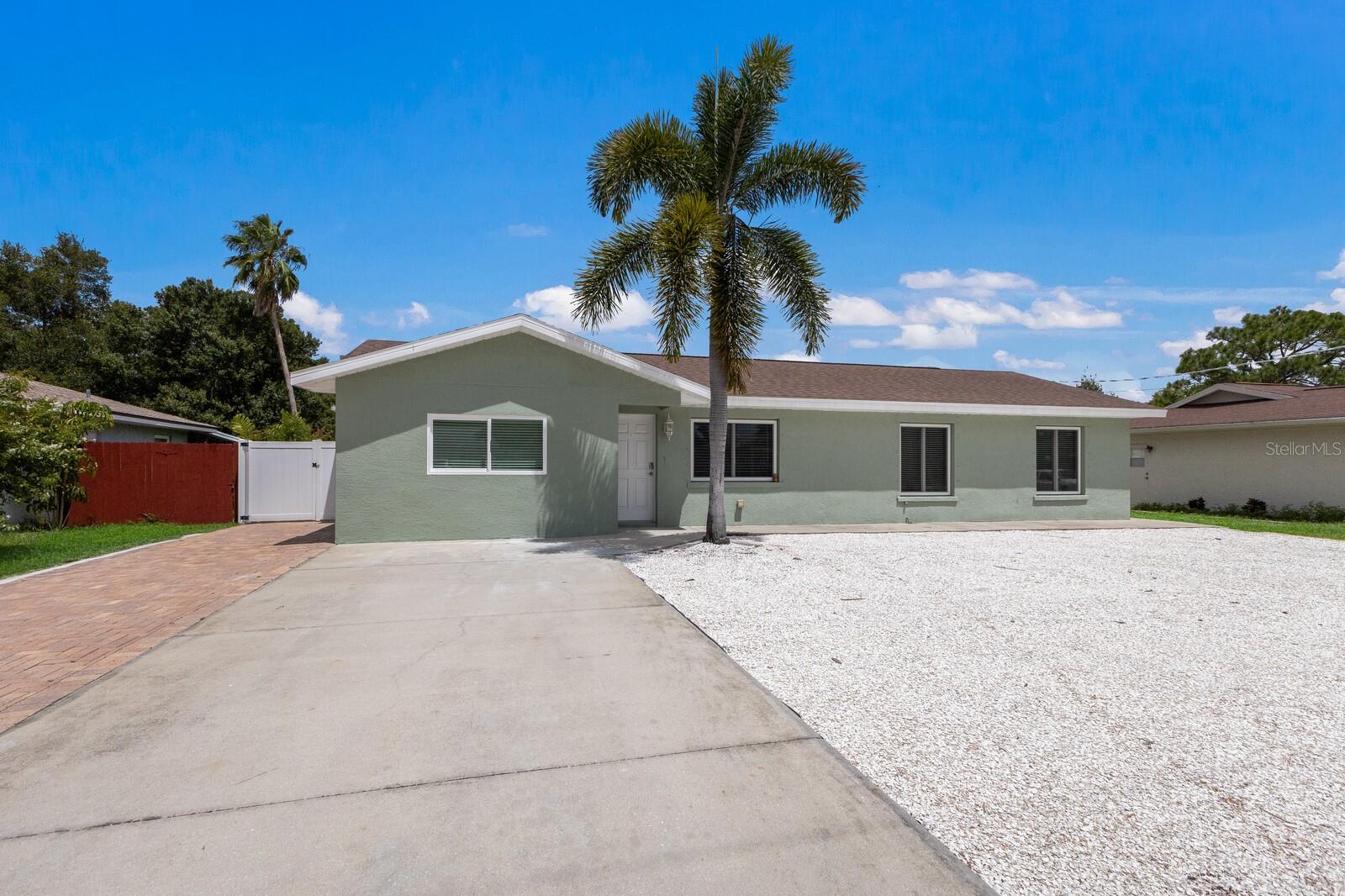 One or more photo(s) has been virtually staged. One or more photo(s) has been virtually staged. Located in the heart of Northwest Bradenton, this beautifully updated 4-bedroom, 3-bath home offers the perfect blend of a central location, great schools, and modern upgrades. The home has been recently remodeled with a brand-new kitchen, updated bathrooms with granite countertops, new flooring, and improvements throughout. With no HOA, you’ll enjoy the freedom to bring your boat, RV, or other toys, and the fully fenced yard provides excellent privacy. The property also includes a 12’ x 24’ detached shed that is fully insulated, air-conditioned, and fully permitted—ideal for storage, a workshop, studio, or home office. This home is just minutes from the beaches of Anna Maria Island, nearby parks, and Bradenton Country Club, making it an exceptional choice for enjoying the best of the area. Major upgrades include a new A/C in 2019, a new roof in 2021, foam insulation throughout the attic, and new windows and doors. Whether you're looking for a family home or a rental investment, this property offers comfort, flexibility, and a highly desirable Northwest Bradenton lifestyle.