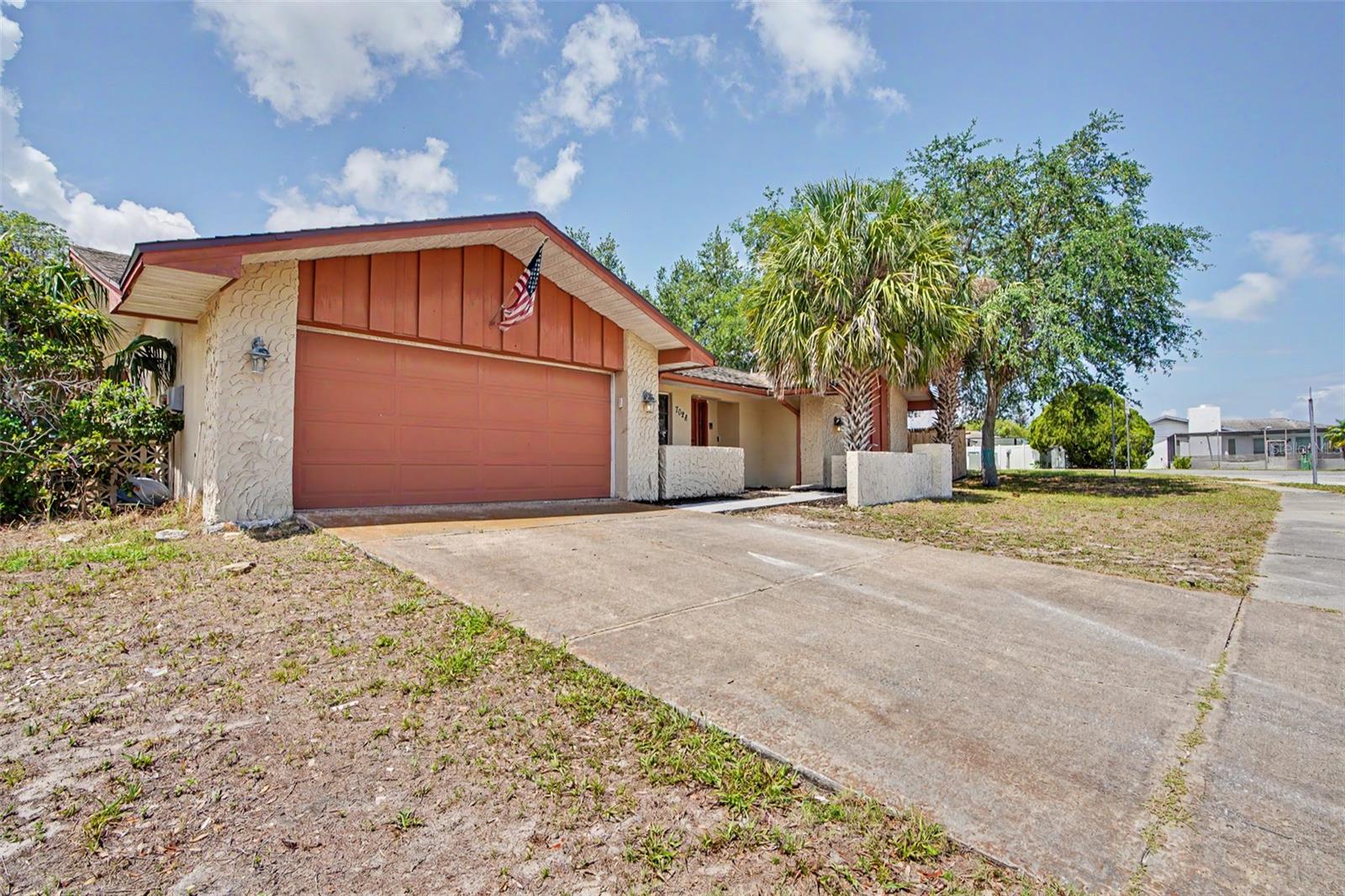 Welcome to 7028 Fernleaf Ct, a spacious 4-bedroom, 3-bathroom pool home situated on a corner cul-de-sac lot in Orchid Lake Village. Offering 2,173 heated square feet and 2,815 total square feet, this single-story home sits on a generous 0.26-acre lot with no HOA and no CDD. The home is located in Flood Zone X with public sewer and county water, giving buyers important everyday conveniences and added peace of mind.
This home checks a lot of important boxes, including a 2016 roof, 2025 air conditioner, and new water heater. Inside, you’ll find a functional tri-split floor plan with four bedrooms and three full bathrooms, offering privacy and flexibility for families, guests, a home office, or multi-generational living. The third bathroom is conveniently located near the pool, making it ideal for use as a pool bath. The home also features central air and heat, ceiling fans, and a primary suite with a walk-in closet.
Step outside and enjoy your own private Florida retreat featuring an in-ground gunite/concrete pool, with the pool cage screening redone last year. The backyard also includes a 16x20 workshop, giving you extra space for storage, hobbies, tools, lawn equipment, or weekend projects. The home is constructed of block, concrete, and stucco and includes an attached 2-car garage.
Conveniently located close to everything, this home offers easy access to US-19, State Road 52, shopping, dining, medical facilities, parks, and local recreation. Enjoy nearby Gulf Coast favorites including waterfront parks, boating, fishing, kayaking, trails, and beaches, with Tampa International Airport approximately 35 miles away. With great neighbors, no HOA restrictions, a private pool, workshop, and major updates already completed, this Port Richey home is ready for its next owner to make it their own.