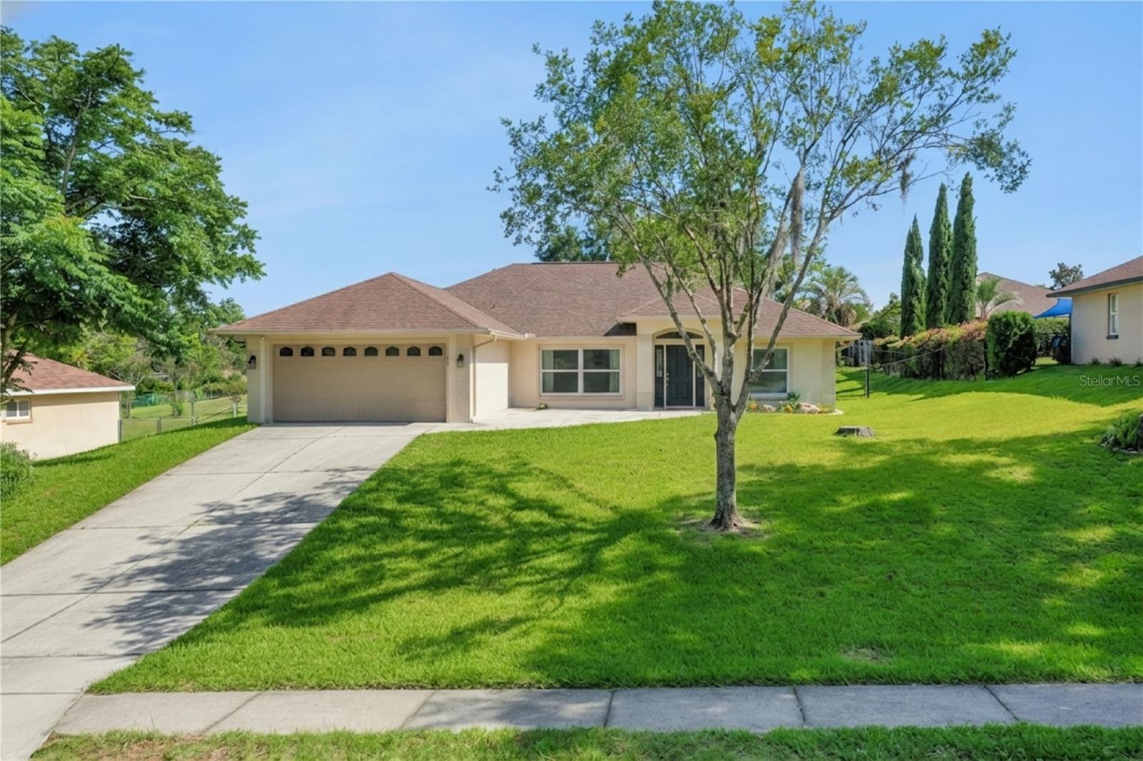 Welcome home to this beautifully maintained, immaculately clean 3 bedroom, 2 bath pool home offering over 1,600 square feet of comfortable living space in one of Clermont's most sought after established neighborhoods. Whether you're relaxing by the pool, enjoying the nearby lakes, or taking advantage of the community amenities, this home delivers the lifestyle you've been looking for. Inside, you'll find a bright and inviting home with a split floor plan, updated primary bathroom and no carpet in the entire home. Featuring premium PGT double-pane impact windows installed by Home Depot just 2 years ago and backed by a lifetime warranty you'll get energy efficiency, peace of mind, and an abundance of natural light. Major updates include a newer water heater, brand new heavy duty Genie garage door opener plus a newer pool pump, helping make ownership worry free. Step outside to your fully screened in patio complete with a fully fenced yard and sparkling pool, perfect for entertaining, pets, or enjoying Florida's year round sunshine. Residents of the Hills of Lake Louisa enjoy neighborhood amenities including a private community boat ramp with access to Lake Louisa, free resident boat and trailer storage, tennis courts, basketball courts, and a welcoming neighborhood atmosphere that has made this community a Clermont favorite for years. Conveniently located just minutes from Downtown Clermont, the Clermont Chain of Lakes, shopping, dining, parks, and waterfront activities, this home offers the perfect combination of recreation, convenience, and community. If you've been searching for an affordable pool home with access to the Florida lake lifestyle, this one deserves a spot at the top of your list!