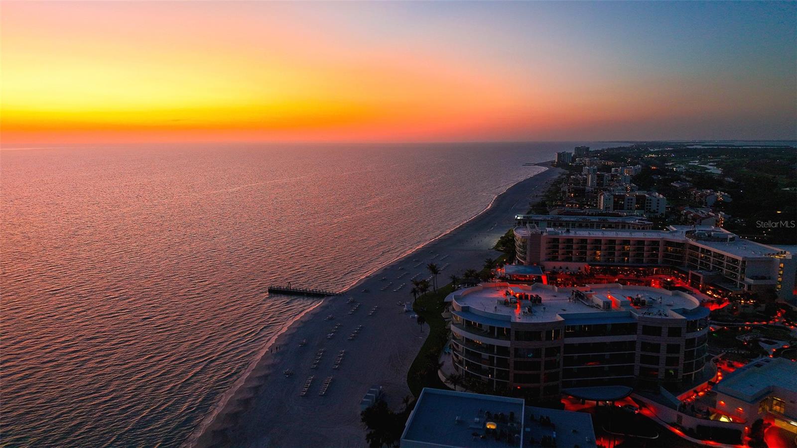 Experience the pinnacle of coastal luxury in the highly sought-after Armand building at The St. Regis Longboat Key, where breathtaking Gulf of Mexico views set the stage for an extraordinary living experience. This residence is absolutely breathtaking and is a must see. Designed for both grand entertaining and effortless everyday living, the expansive great room showcases a sophisticated wet bar and wine refrigerator, all enhanced by striking designer light fixtures and elegant sheers that create a soft, ethereal ambiance. Accordion glass doors seamlessly extend the space onto a sprawling wraparound terrace—complete with a private gas grill and unforgettable sunset vistas. Thoughtfully designed, this gracious room transitions beautifully between formal gatherings and relaxed coastal living. The chef’s kitchen is a true centerpiece, featuring premium Poggenpohl cabinetry, a Sub-Zero refrigerator, Wolf double ovens and gas cooktop, dual dishwashers, and a separate breakfast area with bar and microwave. A large island offers additional seating, making it as functional as it is elegant. Or just order room service! The owner’s suite is a private sanctuary, offering stunning Gulf views and a wet bar perfect for morning coffee or evening unwinding. Dual spa-inspired bathrooms provide two luxurious and private retreats—one with custom closets, an oversized vanity, seamless glass shower, and private water closet; the other with a large vanity, dedicated makeup area, custom closets, seamless shower, and private water closet. A spacious and comfortable club room creates an additional venue for entertaining, complete with a wet bar and beverage refrigerator. Two additional guest bedrooms are equally well-appointed, each opening onto a private terrace. One offers Gulf views, custom closets, and a luxurious bath with a large vanity, makeup area, seamless glass shower, and private water closet. The third bedroom is thoughtfully designed for comfort and privacy, featuring accordion doors to the terrace and a beautifully finished bathroom with a large vanity and makeup area, freestanding soaking tub, seamless glass shower, and private water closet. An elegant powder room adds convenience for guests. Additional highlights include a large laundry room with sink, built-in cabinetry, and hanging rack. The residence is offered fully turnkey, with exquisite furnishings curated by the renowned Marc-Michaels Interior Design—featuring designer-selected finishes, statement lighting, refined furniture pieces, and custom window treatments that create a cohesive, sophisticated aesthetic throughout. Modern living is elevated by fully integrated smart home technology, including iPad-controlled systems, electronic sheers, and blackout shades—delivering both convenience and ambiance at the touch of a button. Nestled within the first branded residential community and ultra-luxe 5 star resort on the Gulf of Mexico. The Residences at The St. Regis Longboat Key blend legendary service with the allure of a seaside getaway. Spanning over 17 acres with 800 feet of direct beachfront, this community offers unparalleled amenities, including the signature St. Regis Butler and Concierge services, a world-renowned St. Regis Spa, in residence dining. Resident only amenities include a clubhouse, fitness center, pool/spa and beach area. Enjoy your private resident only amenities, while having access to all the resort has to offer. Live like you are on vacation all year round!