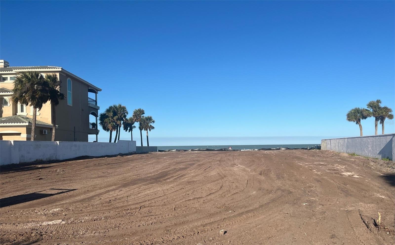 Don't miss out on a once in a lifetime opportunity to own this DIRECT GULF FRONT lot 25% BIGGER than the others!  WELCOME TO THE BEAUTIFUL BELLEAIR SHORE COMMUNITY! Belleair Shore was established in 1955, with just 57 properties along a one mile stretch of pristine beachfront. This is a great opportunity to build your coastal dream home on one of the larger lots (96x234) that Belleair Shore has to offer. This trophy property has direct Gulf Front access to let you live your best beach lifestyle. You will love the walks on the sugary white sands and won't miss a sunset from your backyard. Another bonus, besides this being one of the largest parcels, there is a vacant lot to the North of this property that will never be built on! You’ll enjoy nearby dining, shopping, and recreational activities all within walking distance. There are rendered plans already designed for a new 5,000 sq ft home to be built on this beautiful lot.