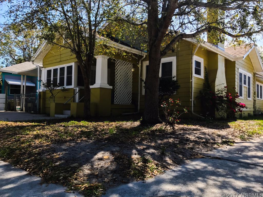 INVESTOR ALERT!! A GRAND OPPORTUNITY to get in on the ground level of New Smyrna's up and coming Historic District.  Located Between US-1 and the River.  A Charismatic Home built in 1924 with original hardwood floors & doors, Newer Roof, Electrical Wiring, Double Pane Windows, Water Heater, A/C Unit, Ridge Vents, Insulation, Screens, Garage Door, and Paint. Crown Molding, Detached Garage, High Ceilings, Drop Down Stair to Attic, Corian Counter Tops, Jetted Tub, and Wheel Chair Ramp.  Four point inspection is available.  Close to Canal Street a hot spot for shopping, restaurants, which hosts a number of events throughout the year.  Flagler Ave, River, Brandon Center, Marina, and the Beach all less than 5 minutes away.  The new large hotel on Flagler is almost open,  New Beach Bar Opening soon, Another new large hotel is planned for 3rd Ave Area, New Marina/Restaurant is to be built next to Captains Quarters, Townhomes being built next to City Hall, and the former marine discovery center land slated to be developed.  This property is a bargain considering what NSB will look like in a few years.  Get in on the ground floor at today's prices. ;Water: City