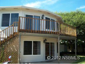 VACATION RENTAL Upper level private octagon house. 2 Bedrooms 2 bath Walk to ocean. Internet -Direct TV. King, 2 Twins, Queen Blow-up Mattress. Living room has VHS, DVD 65" TV - Master Br VHS & DVD 32" TV. 2nd Bedroom has DVD Flat 32" TV. Pet Friendly (up to 30lbs) No Cats.Call LO for seasonal rates & minimum rental periods. Rental rates do not include cleaning, processing fees & taxes.Call LO for variable seasonal rates & for minimum rental period.Rent does not include cleaning, processing fees or taxes.