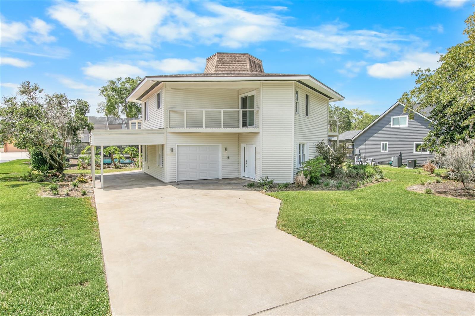 AWESOME UPDATED HANGAR POOL HOME FEATURING 3 EN-SUITE BEDROOMS & 3 BEAUTIFULLY REMODELED BATHROOMS LOCATED ON A 100' X 150' LOT IN SOUGHT AFTER SPRUCE CREEK FLY-IN & GOLF COMMUNITY!! Taxi from your PRIVATE AIRPLANE HANGAR measuring 48' x 38' directly to the community's PRIVATE RUNWAY!! This exceptional home features TWO SPACIOUS LIVING LEVELS with a FIREPLACE ON BOTH FLOORS providing comfort and elegance. The main floor living area includes a large great room with a WET BAR, MINI COOLER & FULL BATHROOM making it perfect for entertaining guests or relaxing after a day of flying. There is also a PRIMARY EN-SUITE BEDROOM ON EACH FLOOR. Newer sliding glass doors lead to screened expansive and inviting RESORT-STYLE SPARKLING POOL that is 10' DEEP! The FULLY-EQUIPPED RENOVATED KITCHEN boasts QUARTZ COUNTERTOPS, STAINLESS STEEL APPLIANCES, EXQUISITE WOOD CABINETRY with SOFT CLOSE DRAWERS, and a GARDEN WINDOW for your herbs, flowers & plants. THREE SPACIOUS EN-SUITE BEDROOMS all feature BEAUTIFULLY UPDATED BATHROOMS creating an ideal layout, convenience and privacy for you and your family/guests. Spruce Creek Fly-In is internationally recognized as one of the premier residential aviation communities in the world. Centered around a private 4,000-FOOT PAVED RUNWAY with GPS APPROACH and paved taxiways, the community is home to pilots, aviation enthusiasts, business professionals, and residents who simply enjoy the peaceful, secure, resort-like atmosphere. Optional membership at the Spruce Creek Country Club offers an outstanding selection of amenities, including an 18-hole championship golf course, tennis and pickleball courts, fitness facilities, swimming, dining, and an active calendar of social events. Numerous clubs and organizations--from aviation groups and fly-outs to art clubs, book clubs, gardening, cycling, and community celebrations--provide endless opportunities to stay engaged and connected. AMENITIES INCLUDE 24-HOUR GUARD GATED ENTRANCE, beautifully maintained parks, walking and biking paths, and a vibrant, welcoming community. Golf cart-friendly streets foster a true neighborhood atmosphere. Ideally located just MINUTES TO THE AZURE ATLANTIC OCEAN BEACHES, SHOPPING, RESTAURANTS, HOSPITALS/MEDICAL CENTERS, SOCIAL & CULTURAL VENUES AND MUCH MORE!!