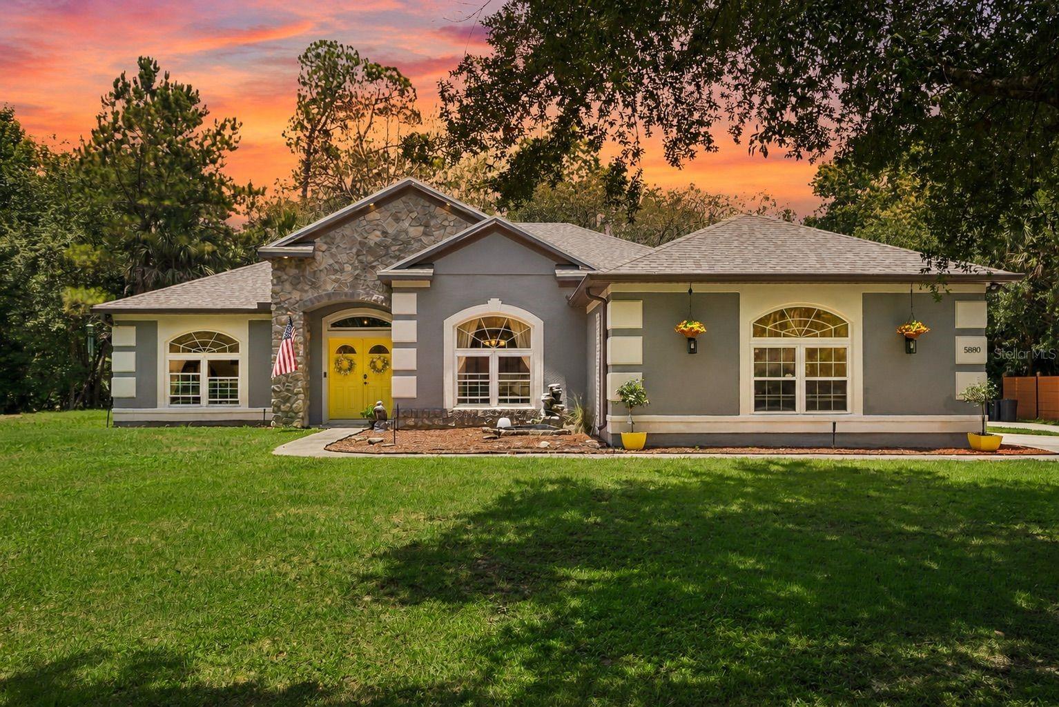 Virtually Staged. Discover the perfect blend of country living, modern updates, and endless possibilities at this spacious 4-bedroom property in Sanford! Situated on a generous parcel, zoned Agricultural so you can keep animals, with no HOA restrictions, this unique home offers plenty of room for multi-generational living, recreational vehicles, boats, and future expansion.

Major system upgrades provide peace of mind, including a brand new AC unit (2026), brand-new roof (2025), smart water heater (2025), lift station septic system (2024), septic cleaning and service (2024), and a new well pump and well system (2024). The majority of the home's windows have also been updated, enhancing energy efficiency and comfort.

Outside, you'll find a 50-amp RV hookup, ample boat and trailer parking, and enough land to explore the possibility of an additional dwelling unit (ADU) or future home site. Whether you're looking for space to spread out, accommodate extended family, store your toys, or invest in future opportunities, this property offers flexibility that's increasingly hard to find.

Conveniently located near public boat ramp access, enjoy easy access to the area's waterways for fishing, boating, and outdoor recreation. Bring your vision and take advantage of this rare opportunity to own a versatile property with modern improvements and room to grow.

Home has private entrance option with perfect In-Law Suite/Multigenerational layout opportunity. Add a kitchenette and door and you'd have a private two bedroom apartment. (Rendering Shown in photos)