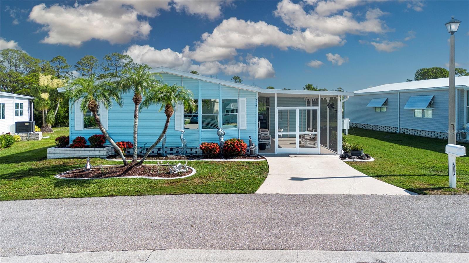 Welcome to 608 Portside Drive in the sought-after, gated Harbor Isles community, where you own the land and enjoy an active Florida lifestyle. This rarely available Jacobsen floor plan offers a true 3-bedroom, 2-bath split-bedroom layout, providing both comfort and privacy.
The spacious interior flows seamlessly into the enclosed lanai, creating additional living space perfect for relaxing or entertaining. The kitchen features beautiful granite countertops, abundant cabinetry, pull-out drawers, and a generous pantry. Plantation shutters accent the living room windows, while skylights fill the home with natural light.
The primary suite offers a peaceful retreat with an en suite bath featuring dual sinks and granite countertops.  Enjoy Florida living with two screened lanais, an outdoor patio, and tranquil preserve views. Sip your morning coffee in the breakfast nook or back lanai while watching the sunrise over the natural landscape. The front screened lanai can be converted back into the carport.
A spacious workshop with electricity and a window provides the perfect space for hobbies, crafts, or storage.   The interior laundry includes the washer and dryer for added convenience.
This home is being offered furnished and has been thoughtfully maintained including a new roof (2023), new A/C compressor (2025), and updated tie-downs for insurance.    Low $196 monthly HOA a plus and no CDD fees!
Harbor Isles is a vibrant waterfront community offering exceptional resort-style amenities, including a marina with boat access to the Myakka River and the Gulf, kayak launch, heated pool and spa, fitness center, clubhouse with an active social calendar, library, tennis, pickleball,  shuffleboard, bocce, horseshoes, fishing, and beautifully maintained grounds.   
Conveniently located near shopping, dining, medical facilities, downtown Venice, Wellen Park, and the Gulf beaches, this home offers the perfect blend of comfort, convenience, and Florida waterfront living. Schedule your private showing today!