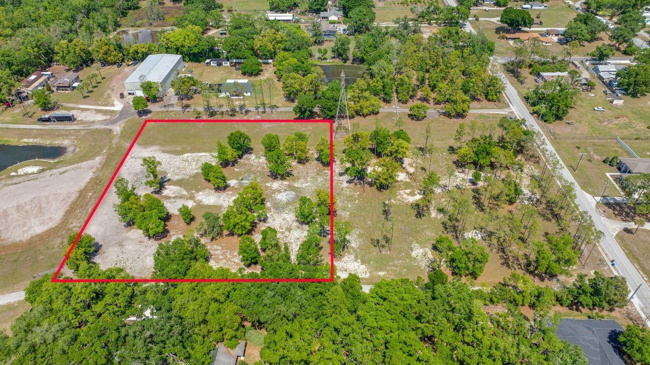 Beautiful, ready to build lots available in the highly desired town of Lutz. This exceptional property offers the perfect blend of peaceful airy pines, rural living with convenient access to urban amenities. Build your dream country estate on this 2.52 acre lot. Commute is close to I-275, I-75 and the Veterans Expressway. Property like this is hard to find with No HOA or CDD fees. The adjacent 2.68 acre lot(separate listing) is available as well if you are looking for a larger lot of approximately 5.2 acres. There is also a 100’ Florida Powerline easement on the North side of the property.