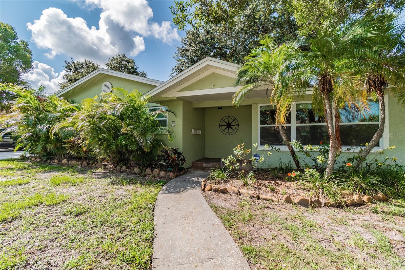 Utilities and lawn care are included!! This charming 2 bedroom, 2 bathroom overlooks the Bellair Country Club Golf Course and is a short drive to beaches , shopping and restaurants. Features include a wood burning fireplace, new A/C unit, washer/dryer and beautiful backyard. The primary bedroom has a walk in closet with plenty of storage. The one car garage is attached. No pets please.