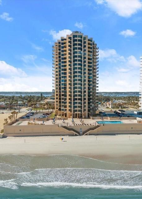 Beautiful Ocean & River Views — Experience the Best of Coastal Living!
Imagine starting your day on your private balcony, coffee in hand, as the sun rises over the sparkling blue waters of the Atlantic Ocean. Watch dolphins play in the morning surf as waves roll onto the sandy shoreline, while seagulls and pelicans glide along the beach in search of their morning catch. As evening falls, unwind with breathtaking sunset views over the Halifax River (Intracoastal Waterway), where boats drift home after a day on the water. On select days and nights, enjoy the added bonus of spectacular rocket launches lighting up the sky. This beautifully decorated coastal retreat of 2 bedrooms and 2 bathrooms, with tile flooring throughout, located on the 18th floor for stunning panoramic views. Beautiful shutters adorn each window from ceiling to floor with the windows and sliding door hurricane impact. Oceans One offers a secure-entry building along with exceptional amenities, including a stylish clubhouse for entertaining, a state-of-the-art fitness center, a welcoming lobby, underground parking, private garage storage and onsite management. With only six units per floor, you’ll also appreciate the convenience of a dedicated laundry room on each level.  Enjoy sunning by the sparkling pool and spacious lounge area. Perfectly situated across from pickleball and tennis courts, a playground, and just moments from restaurants, shopping, Publix, McElroy Park, Van Alder Dog Park, and the Daytona Beach Shores Community Center—there’s always something to enjoy right outside your door. You’re just minutes from the excitement of Daytona International Speedway, Bike Week, Jeep Week and countless local events including festivals, art shows, charity runs, and more. Take in stunning views from the top of Ponce Inlet Lighthouse, or head to the inlet where surfers from around the world gather to catch some of Florida’s best waves. Enjoy the rare privilege of driving on the beach, or simply park, relax, and sink your toes into the sand. Boating enthusiasts will love the nearby marinas and public launches, offering easy access to the Intracoastal Waterway, Atlantic Ocean and nearby disappearing islands—perfect for a day of adventure. Anglers and nature lovers alike will appreciate the rich estuary, known for incredible fishing, birdwatching, and diverse marine life. Prefer something quieter? Kayak through serene backwaters and take in the natural beauty at your own pace. Golf courses—both public and private—are just a short drive away. With easy access to I-95 and I-4, you’re a little over an hour from Orlando’s world-famous attractions, historic St. Augustine, and the Kennedy Space Center. With a new roof in 2021, this building has been well maintained and passed all inspections and has no Special Assessments pending.
This isn’t just a home—it’s a lifestyle. Soooo, come see for yourself and discover why this special place is ready to welcome its next owners. I can’t wait to meet you.