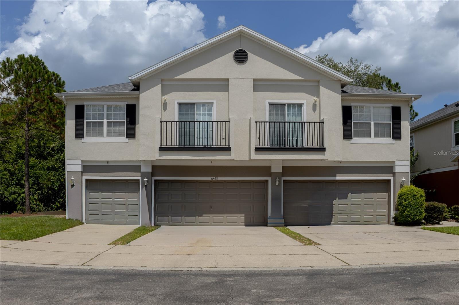 Located in the gated community of Carter Glen, this move-in ready 2 bedroom, 2 bathrooms end-unit townhome is in like-new condition. Situated on a quiet cul-de-sac with easy access to visitor parking just steps away, this home is perfect for entertaining. Inside, the spacious kitchen overlooks the living area and boasts large cabinets and stainless steel appliances. The primary suite features dual sinks, while the private balcony is ideal for enjoying beautiful sunsets. Additional highlights include lovely conservation views from inside the home. Residents enjoy excellent community amenities such as a beautiful pool, fitness center, clubhouse, and playground. Just minutes from Lake Nona, the airport, and major highways, schools, restaurants and shopping center. This exceptional townhome won’t last long—schedule your showing today!