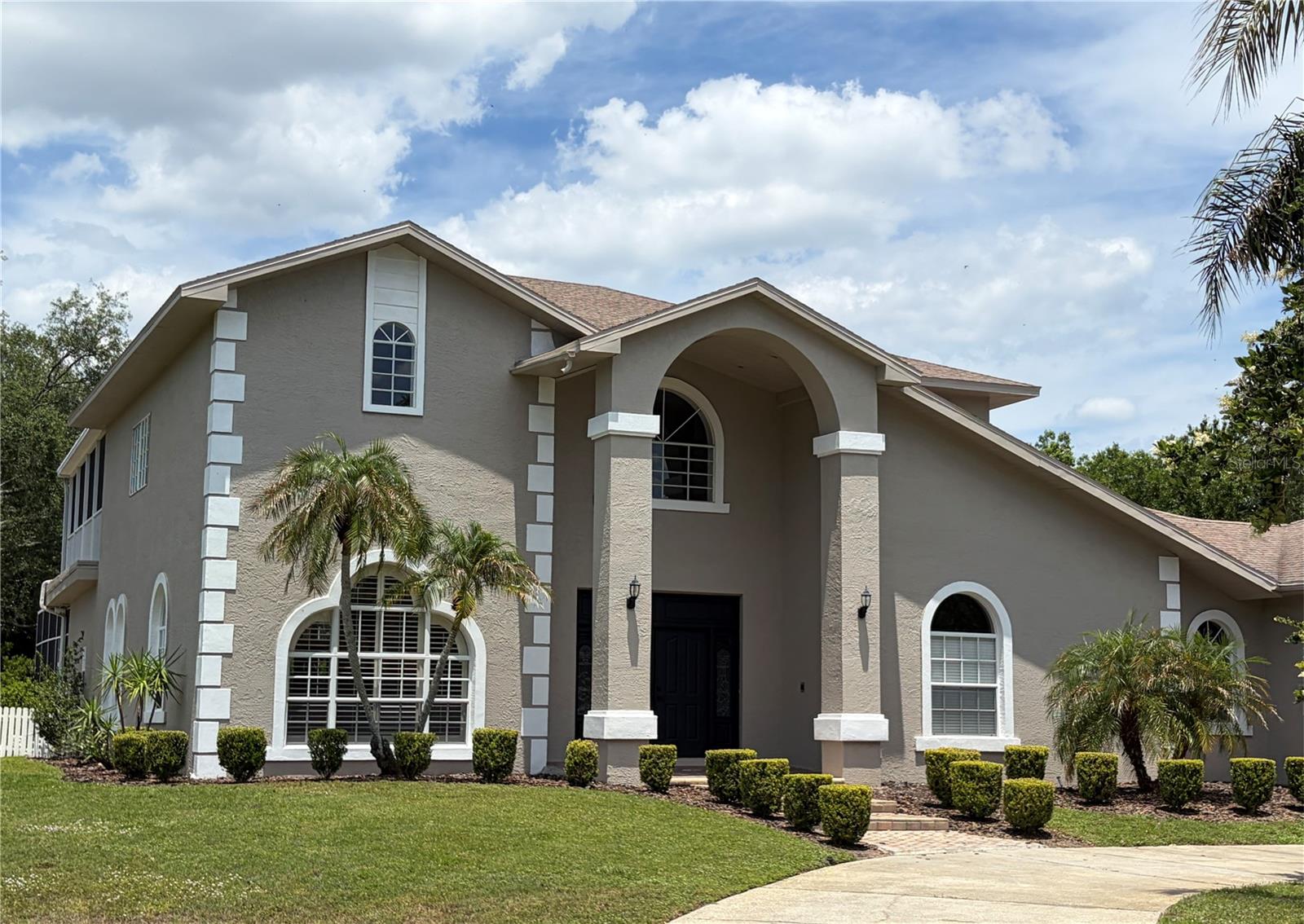 NEW COMPETITIVE PRICE!  THIS PROPERTY WILL NOT STAY ON THE MARKET LONG! DO NOT MISS THIS RARE OPPORTUNITY!  Situated on a quiet cul-de-sac, this stunning updated luxury estate sits on nearly one acre and offers a rare combination of lots of privacy, space, and comfort in one of Tampa Bay's most desirable upscale neighborhoods. Surrounded by a wooded buffer on one side and privacy fences from the neighbors on the other side and the rear, this property provides a peaceful, private setting that is incredibly hard to find. With no through traffic and a spacious homesite, this home delivers a true sense of seclusion while remaining conveniently located near shopping, dining, and top-rated schools. Inside, this home offers over 4,100 square feet of thoughtfully designed living space, including 5 bedrooms with walk-in closets and 5 full bathrooms. The layout includes multiple living and entertaining areas, creating flexibility for both everyday living and hosting. The outdoor living space is equally impressive, featuring an  oversized pool and spa, an oversized lanai, and expansive yard space with room to relax and entertain. It also includes a 3-car garage and a huge driveway with plenty of parking in the front and the side of the house. Opportunities like this - offering nearly one acre estate in one of the most desired upscale luxury neighborhoods of Tampa Bay in a top-rated school district, tons of privacy, and an updated home within a cul-de-sac setting - are extremely rare in this area. Do not miss owning this rare gem!