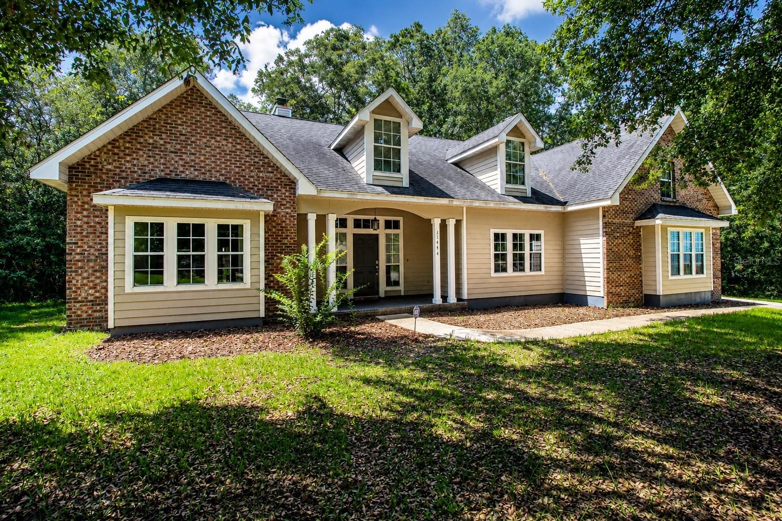 Virtually Staged. Welcome to this beautifully updated 5-bedroom, 3-bath home on a quiet cul-de-sac in the highly sought-after Fletcher's Mill community in Gainesville, FL! This move-in-ready home features a remodeled kitchen and bathrooms, brand-new stainless steel appliances, stone countertops, and a large center island that opens to the spacious living area—perfect for entertaining. The desirable split floor plan offers added privacy, with 4 bedrooms on the other end of the home. Two secondary bedrooms share a convenient Jack-and-Jill bathroom. Upstairs, you'll find a versatile bonus room or 5th bedroom over the garage. Enjoy a fully fenced backyard ideal for pets, plus the peace of mind of a new HVAC system, new water heater, and a roof to be replaced with an acceptable offer. Conveniently located just minutes from the University of Florida, UF Health Shands Hospital, HCA North Florida Hospital, Santa Fe College, I-75, shopping, dining, and North Gainesville amenities. Don't miss this incredible opportunity—schedule your private showing today!