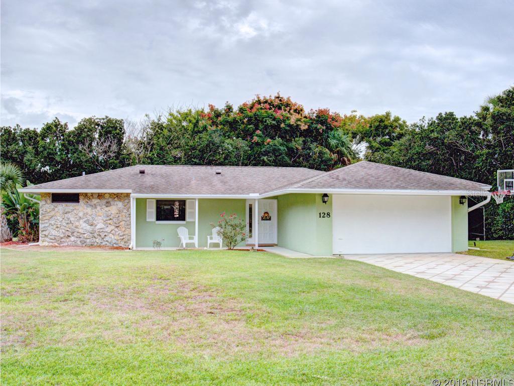 From its architectural shingled roof to the Coquina rock accented corner, this delightful 3 bedroom 2 bath concrete block home is as charming as its picturesque surroundings in the peaceful Corey Estates subdivision and just steps away from the inter-coastal waters of the Indian River. Homeowners in this community enjoy deeded boat access to the river from a private boat ramp and fishing pier which means you can spend the day fishing in some of the best waters in the state. From the moment you enter through the solid wood door, you will admire the crown molding and soft indirect lighting throughout which adds elegance and grace to each room.  The Desirable open split bedroom floor plan is bright and cheerful and offers lots of living space in the living room and dining room areas.  The kitchen has an easy to work in design with ample cabinet and counter space and a breakfast bar perfect for 2.   All 3 bedrooms feature Parquet flooring and the master bath in the cozy master bedroom features a beautifully tiled step in shower.  Adjacent to the living room, is the spacious Florida room. This large, tile floored, air-conditioned room overlooks the vast private back yard and patio that features a custom cement design, which matches the driveway, and is partially covered with a charming pagoda making it perfect for relaxing after a long day or for entertaining friends and family.  The beautiful 125 X 125 LOT is adorned with magnificent native foliage and the whole yard stays plush and green with the well sprinkler system.  Other features include the large finished shed with electric and dehumidifier and plenty of room for parking your RV, boat, or ATV in addition to the 2 car garage. ;Water: City