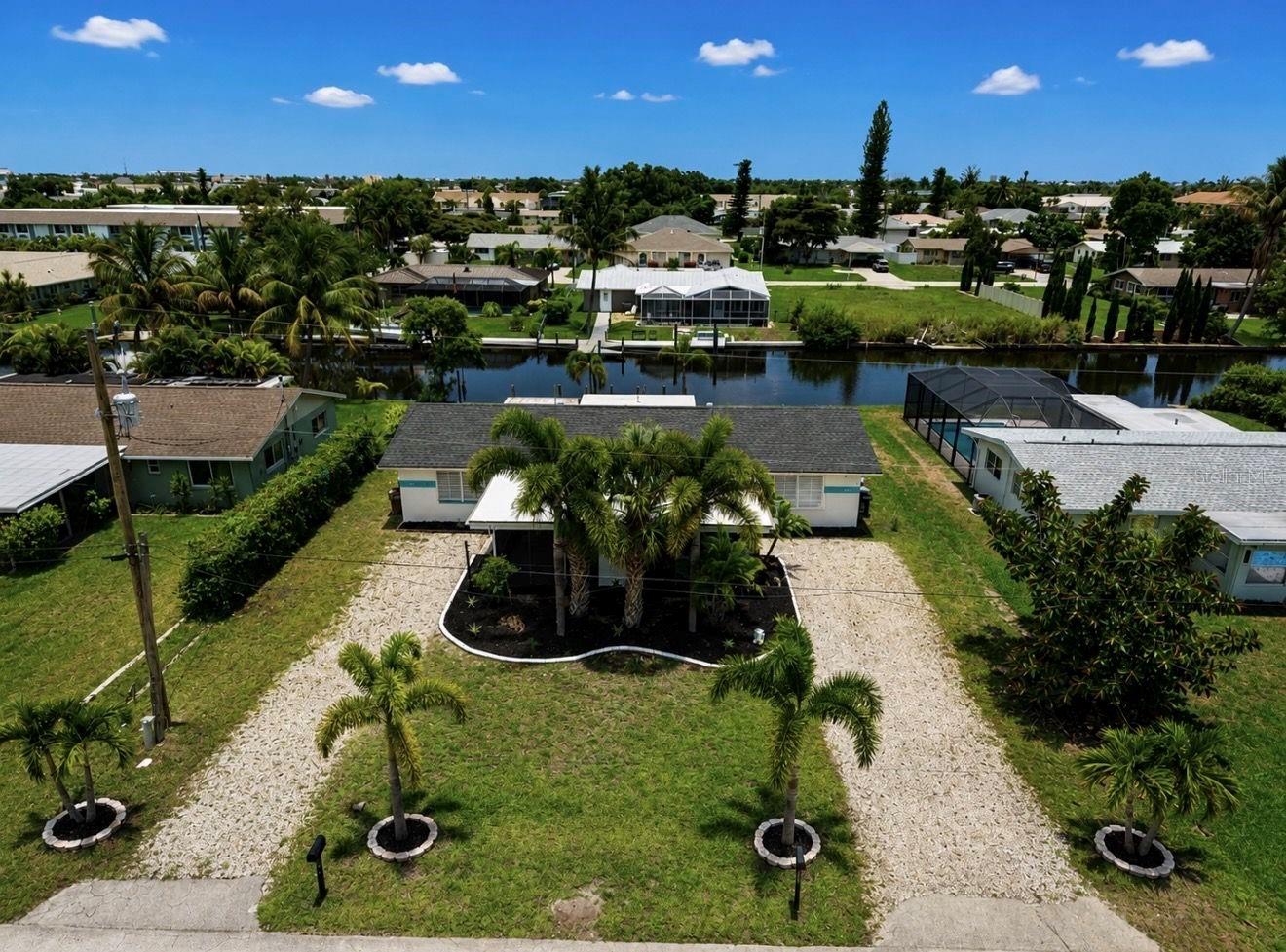 Freshly updated 2, 2-bathroom Gulf Access home with an enclosed lanai and spacious backyard. Enjoy about 80 feet of water frontage with only one bridge to the river. Just 1.5 miles from Cape Coral Beach and a block from great restaurants and shopping in downtown Cape Coral. The unit includes its own washer and dryer, ample storage, a Nest thermostat, and Ring cameras you can control from your phone—perfect for true vacation living!  

Note: This is a duplex with its own parking and backyard, offering a single-family home feel. There are two identical units—one fully furnished (turnkey) and the other unfurnished. For a fully furnished/turnkey unit, reference: 4933 Victoria Dr Cape Coral, FL 33904.