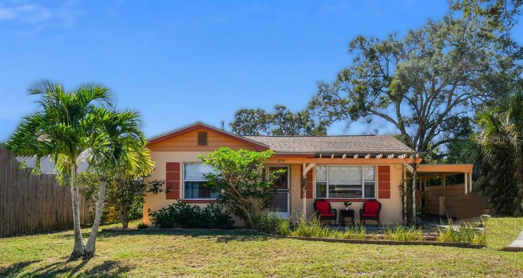 Location, location, location.... 1215 Union Street is less than 1/2 mile from the Gulf of Mexico, one block from the Pinellas Trail, walking distance to the Toronto Blue Jays Stadium or a quick golf cart ride to downtown Dunedin!

This home has something for everyone.  A He / She shed - but really, it's an oversized detached garage with workshop and storage.  The backyard is one my favorite spaces, its low maintenance with artificial turf, perfect for pets and young ones, plus privacy fence.  Many areas on the patio to relax with your morning coffee, read a book or enjoy the BBQ and firepit in the evenings.

The inside is just as comfy!  Welcoming front entrance, open and inviting Livingroom.  Custom built in dinning nook that seats 6 comfortably.  Table is on casters for easy access to benches. Kitchen has been updated with newer SS appliances, butcher block countertops and penny tile backsplash. Off the kitchen is a bonus space that currently works as an office, but could be a workout room, craft room, etc. plus half bath and stackable laundry closet.  Tile floors throughout main living areas, laminate in bedrooms.  Master bedroom is roomy enough for a king-size bed that overlooks the backyard.  Front bedroom has a coastal feel that is bright and cheery.   

Just in time to celebrate the holidays, Florida style in this great home, in a great location for a great price!