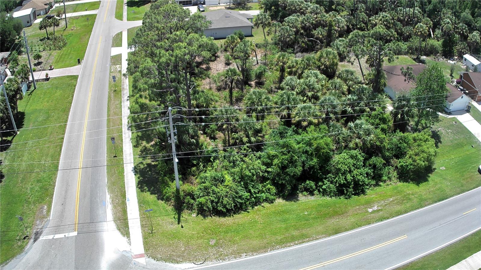 Discover the endless opportunities this corner lot offers. Located on the corner of Chamberlain and Cranberry Blvd with just a short drive to the highway for quick access to Tampa or Cape Coral. Along with everyday conveniences, shopping and dining right up the road. Enjoy activities like Downtown Wellen park, beaches, Warm Mineral springs and a bunch more with the ongoing development North Port brings.