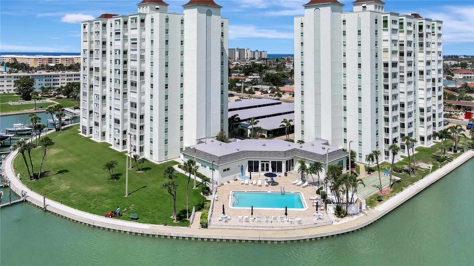 LOCATION! LOCATION! This Waterfront 2-Bedroom, 2-Bath Condo at 400 64th Ave, St. Pete Beach is Priced to Sell!  Enjoy stunning water views from the primary bedroom. Step into a space where elegance meets effortless living. The current owner has spared no expense in upgrading this property, featuring a stunning cotemporary kitchen, beautifully refreshed bathrooms, and stylish new fixtures and updates throughout,  This is true turn-key living and move in ready.   This beautifully updated 2-bedroom, 2-bath condo located in the heart of St. Pete Beach and walkable to everything. Recently renovated throughout, this home blends modern comfort with coastal charm. Bright and airy living spaces create a perfect setting for relaxation or entertaining. Step outside to take in serene water vistas and gentle ocean breezes. Ideal for year-round living or a vacation retreat, this condo offers the ultimate blend of style and location. Own a condo with RESORTY STYLE amenities and still be able to go up one flight of stairs to you private condo.  Don’t miss your chance to own a slice of paradise on St. Pete Beach!